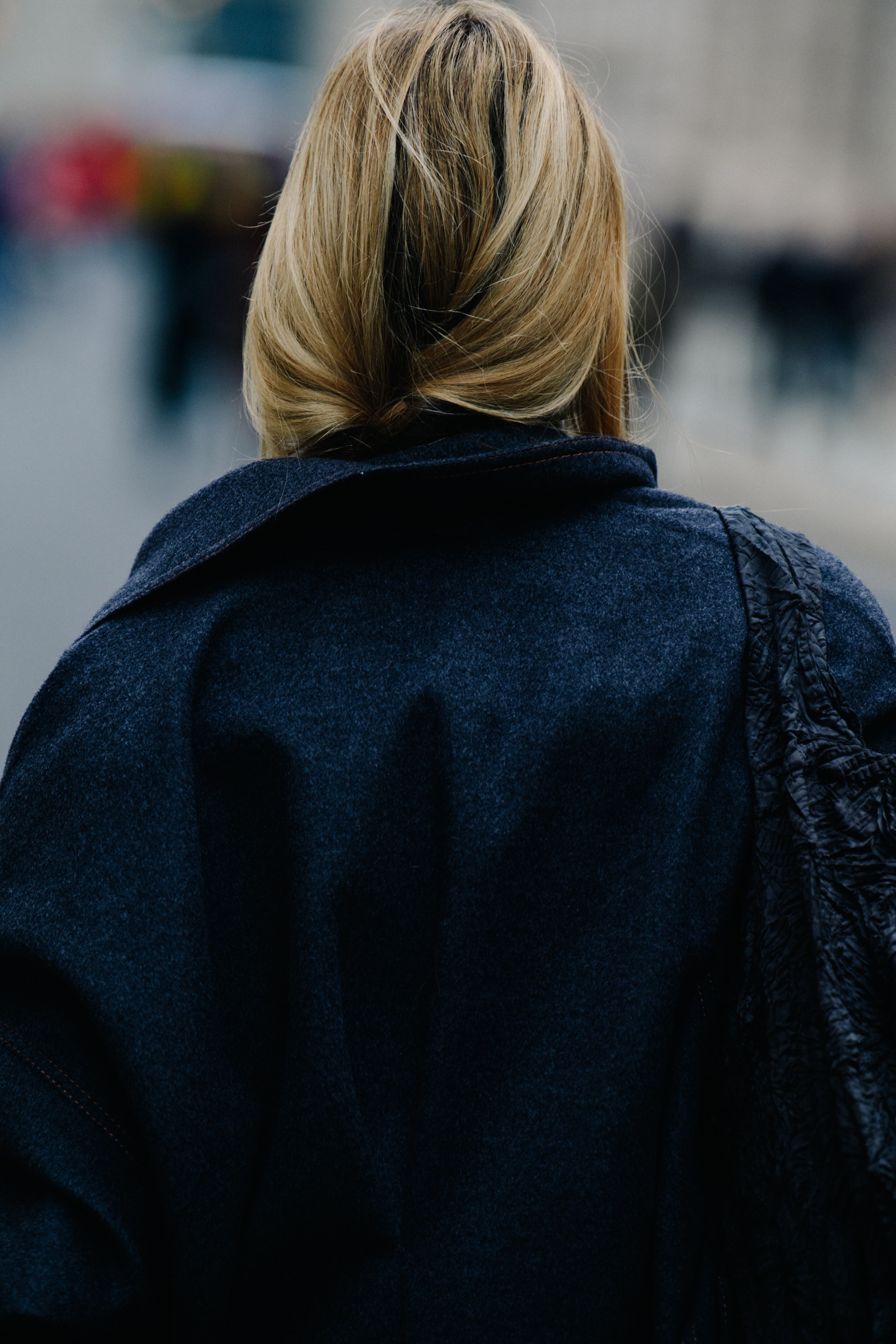 Woman wearing grey coat