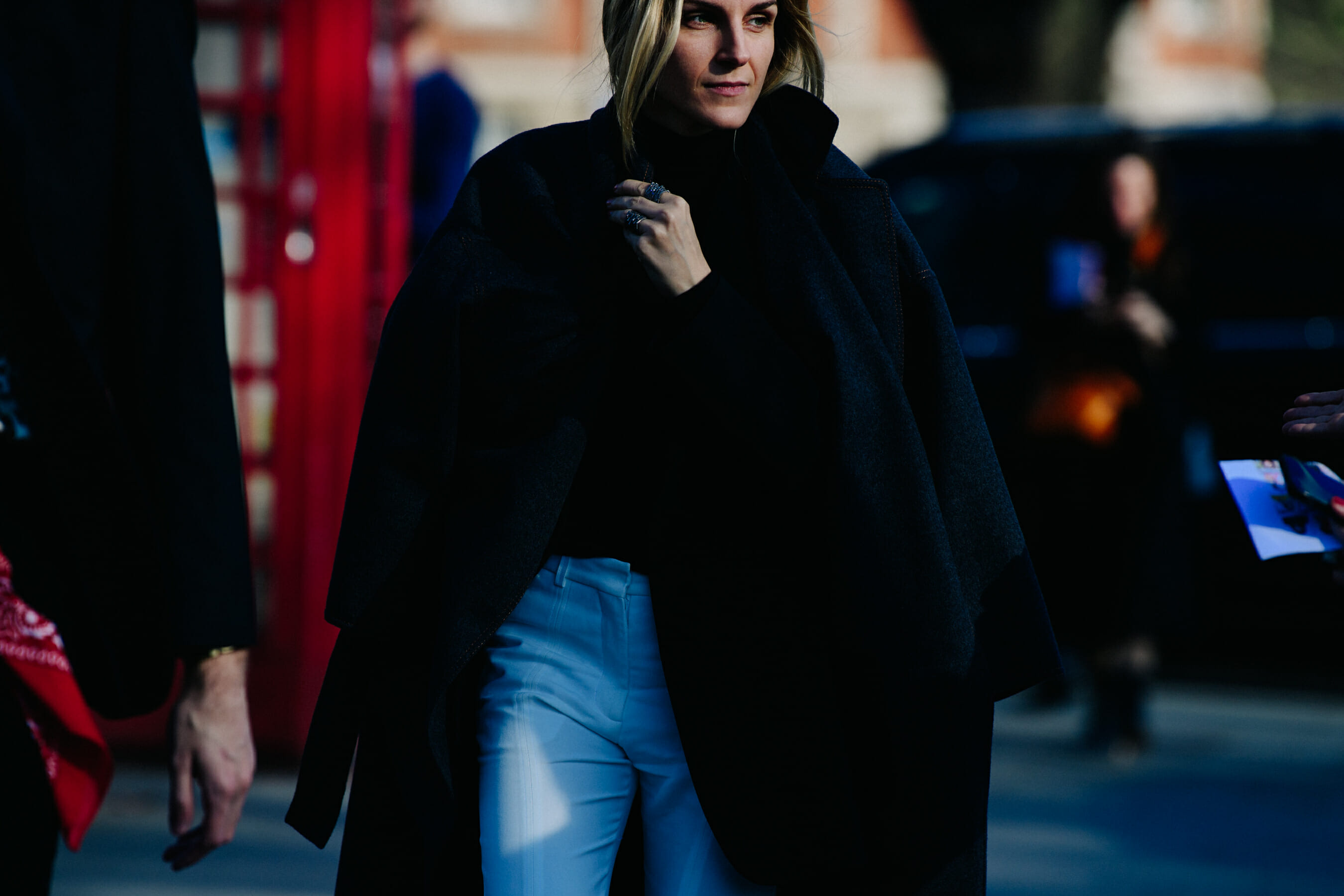 Woman wearing light blue pants