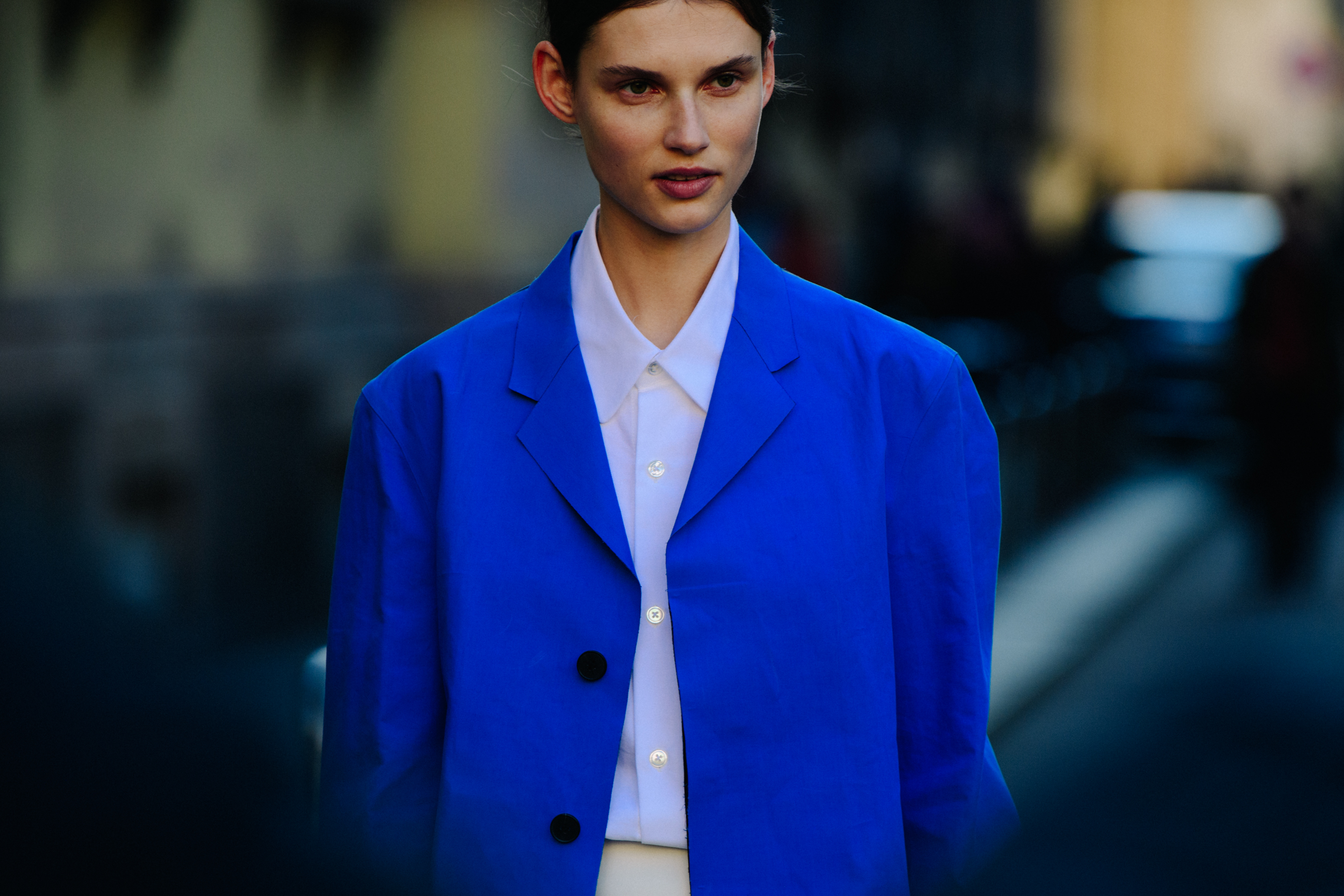 Model wearing blue jacket