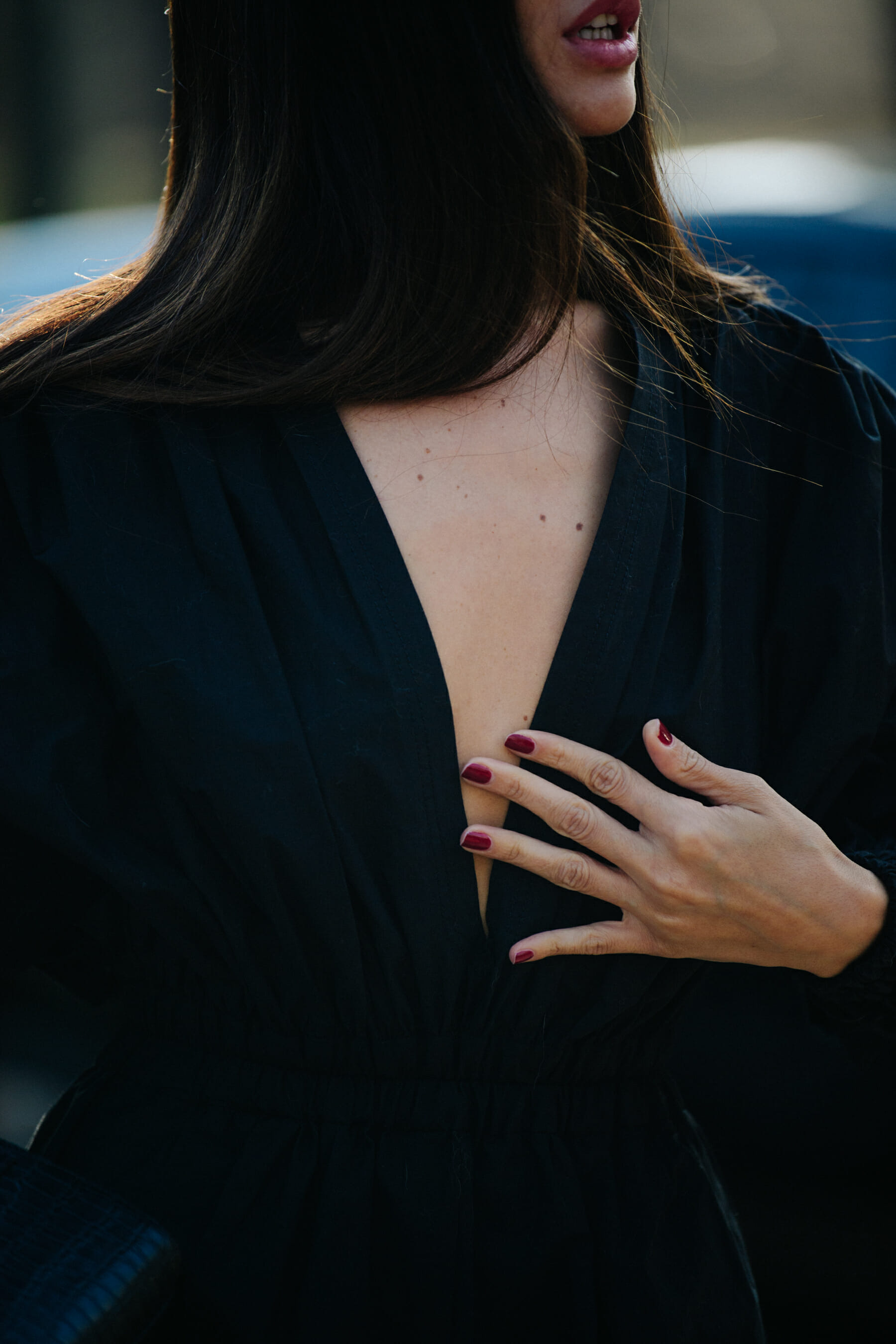 Italian woman wearing black dress