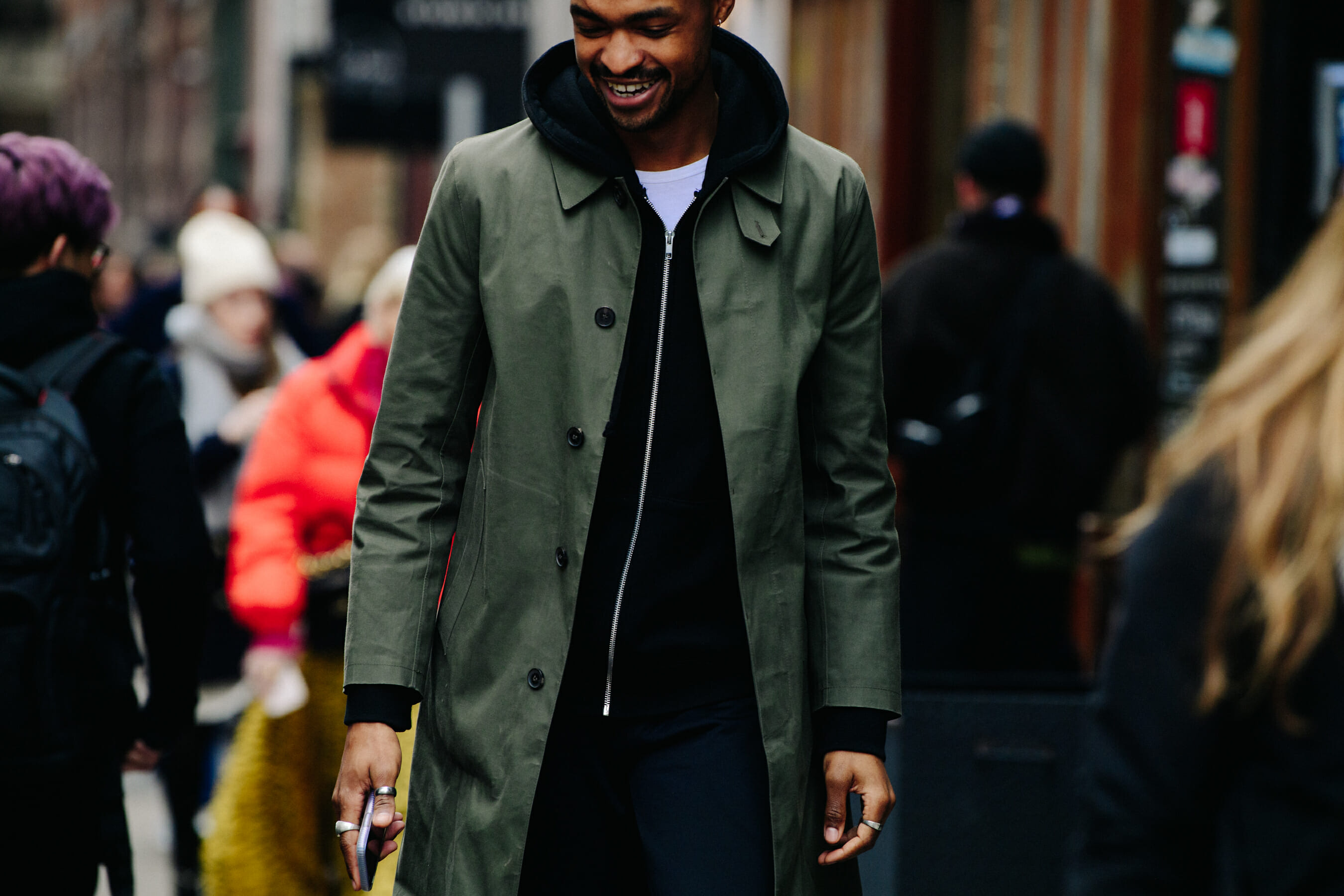 Man wearing green coat