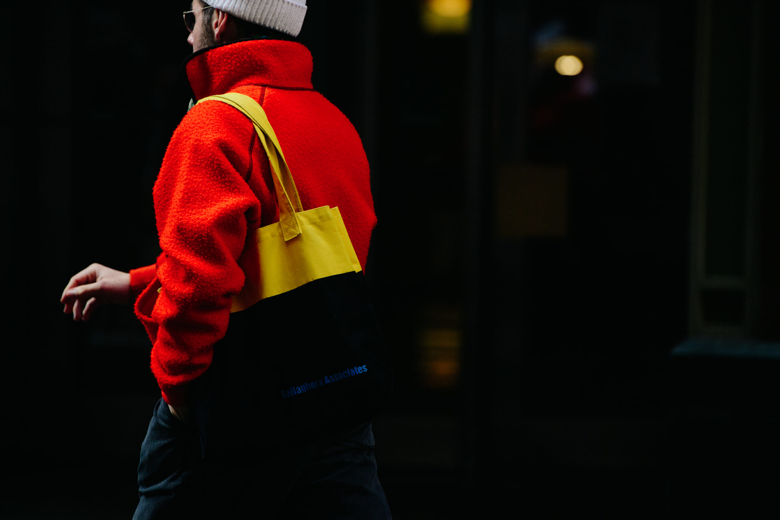 Man wearing orange jacket