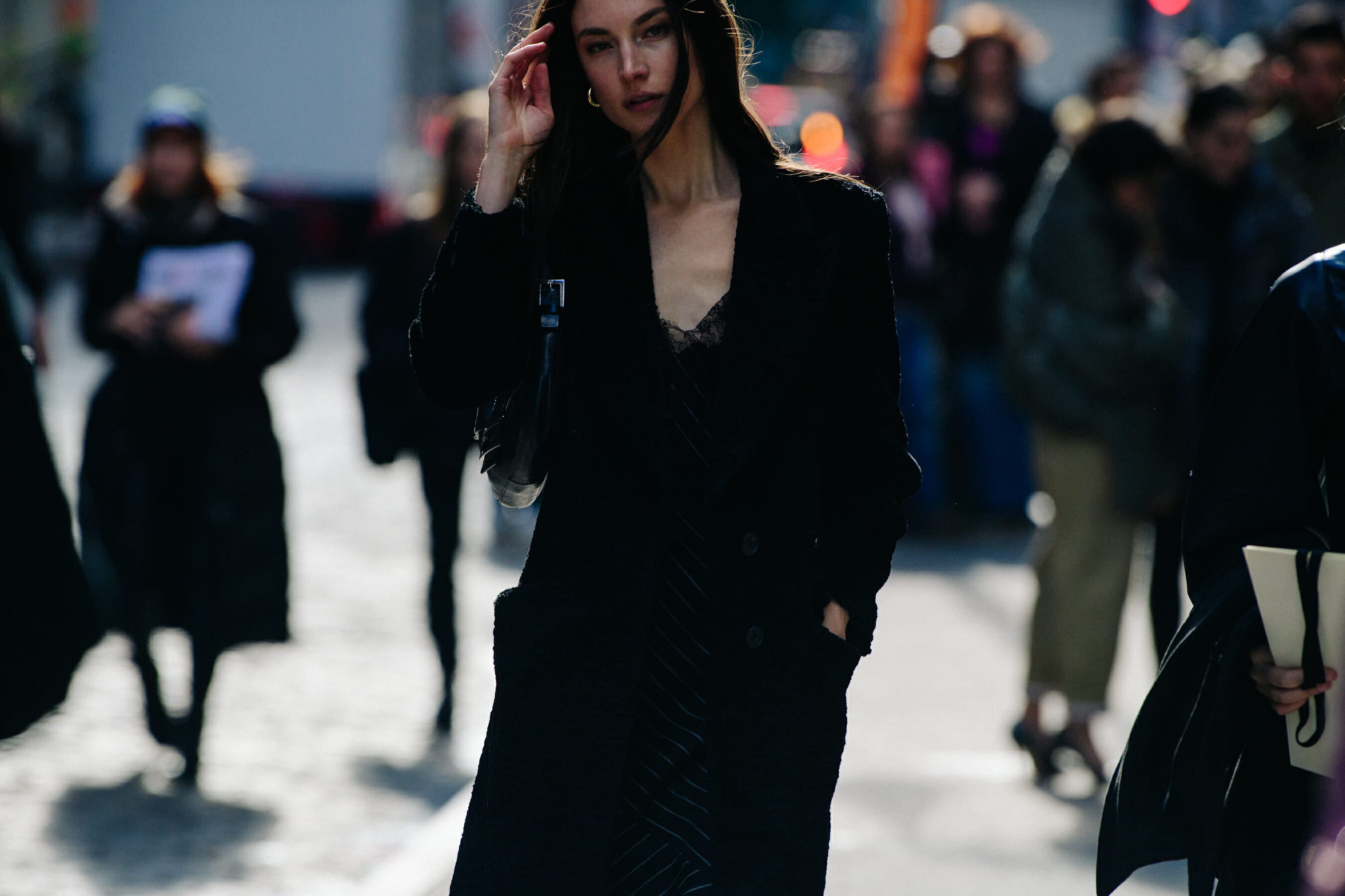 Model wearing black coat