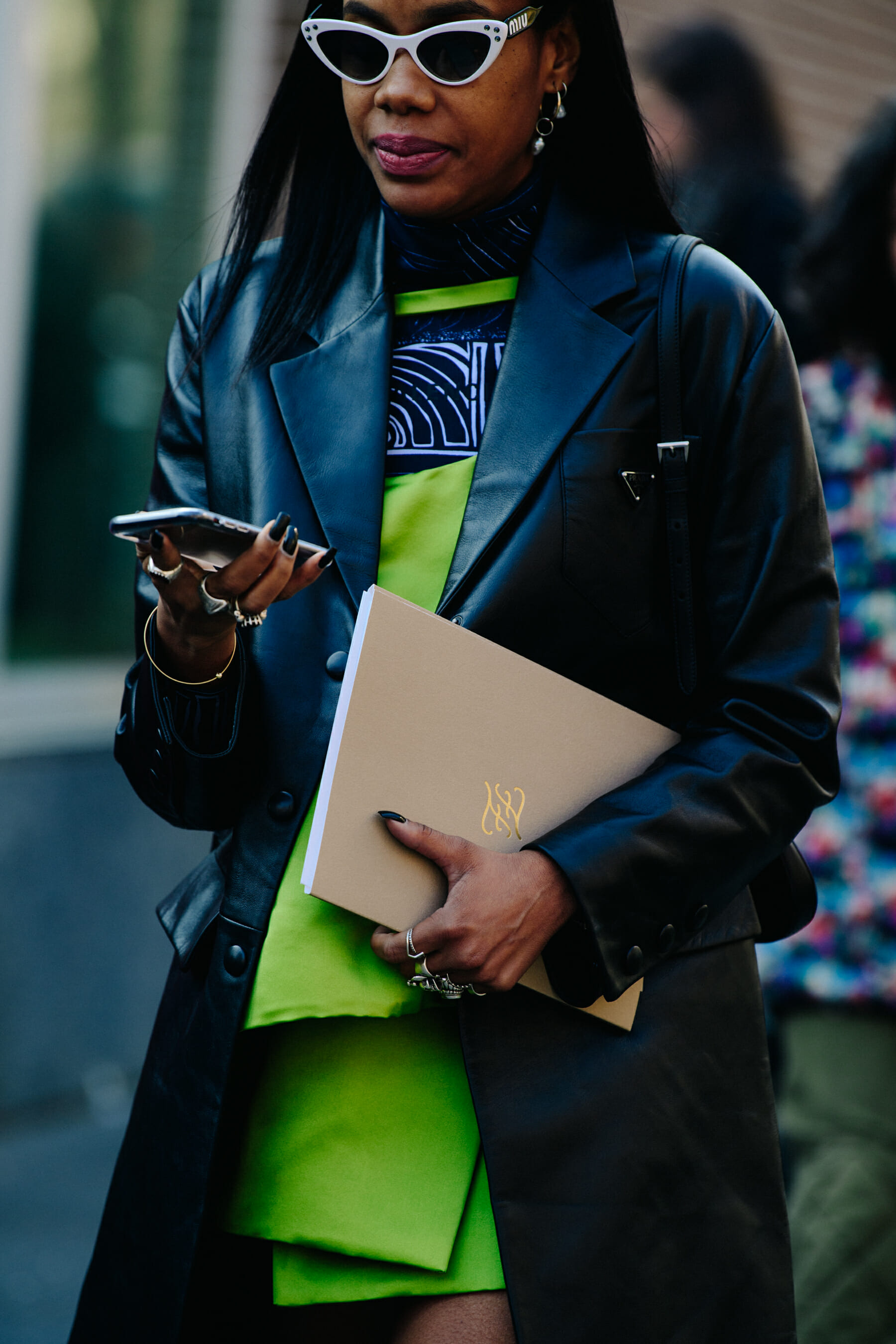 Woman wearing Prada coat