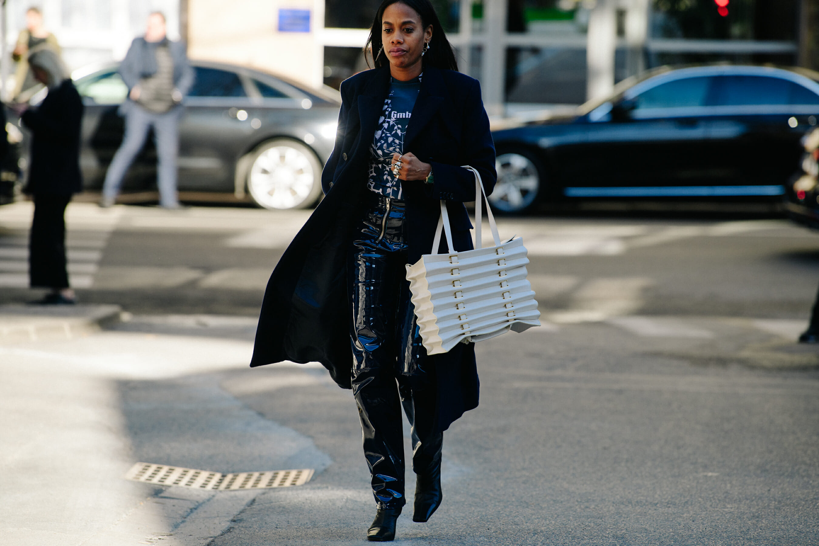 Woman carrying white bag