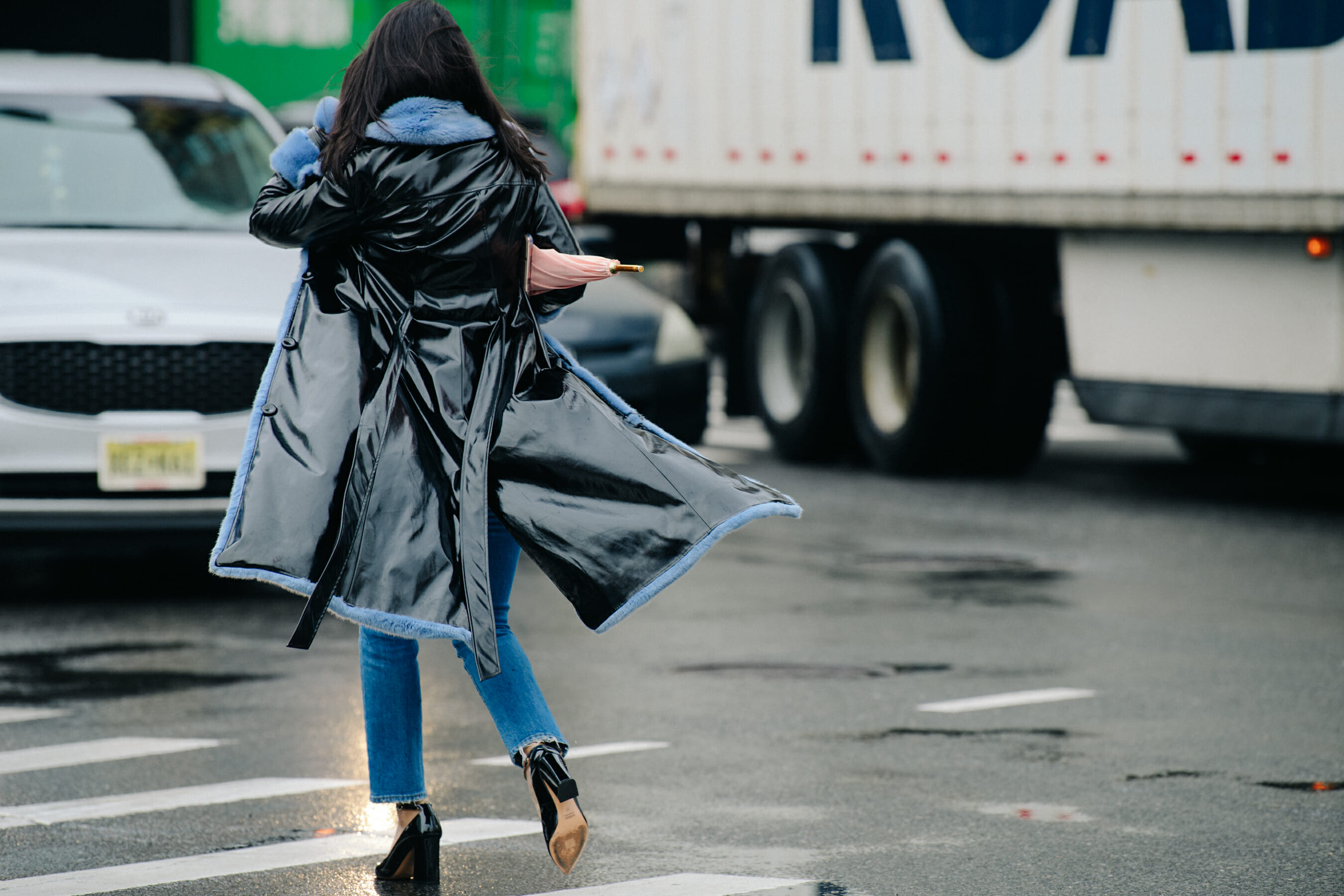 Woman wearing blue fur trim coat