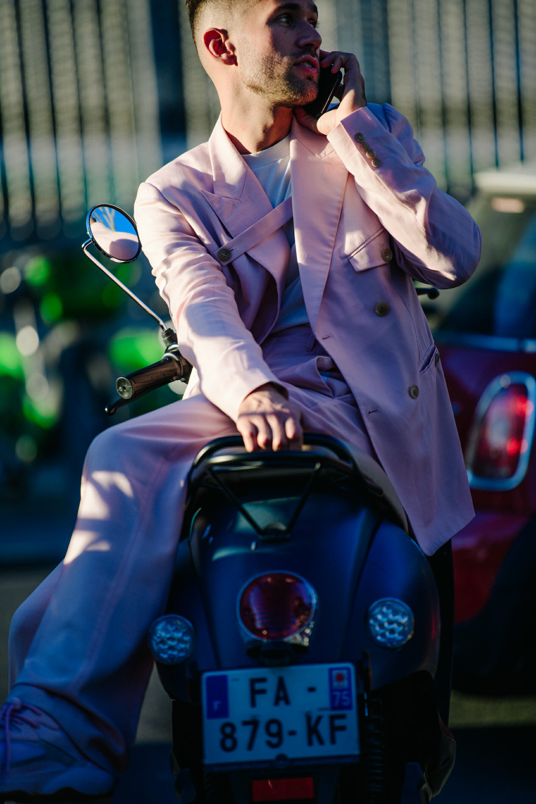 Man wearing pink outfit