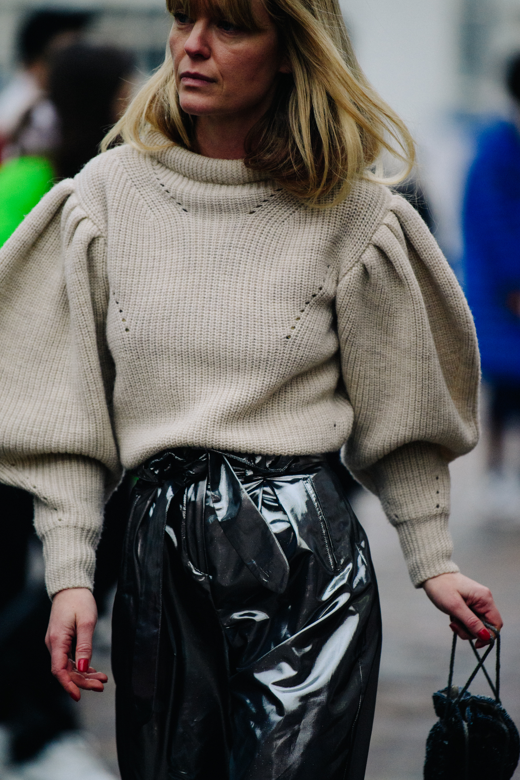 Woman wearing silver pants
