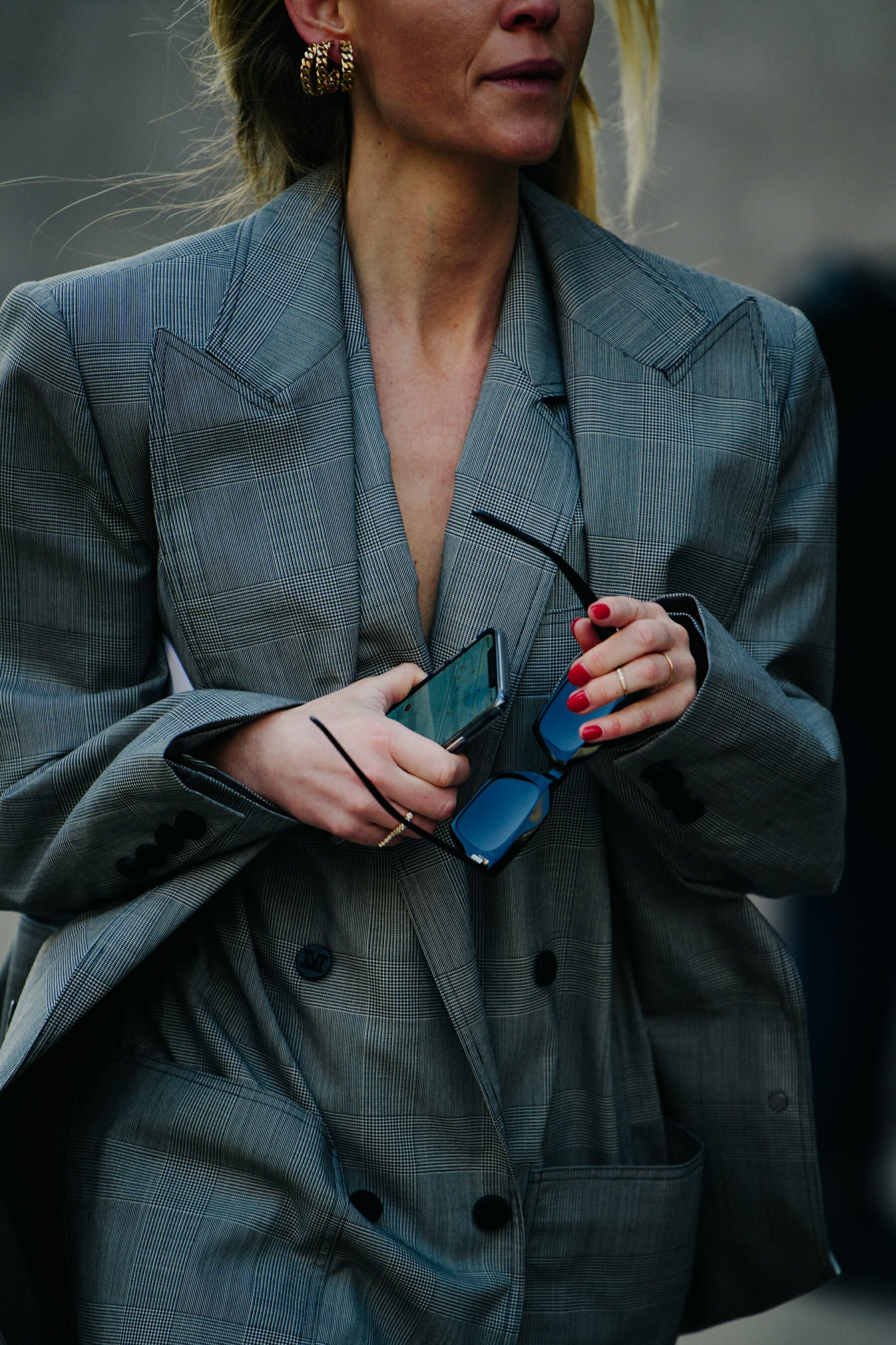 Woman wearing grey suit