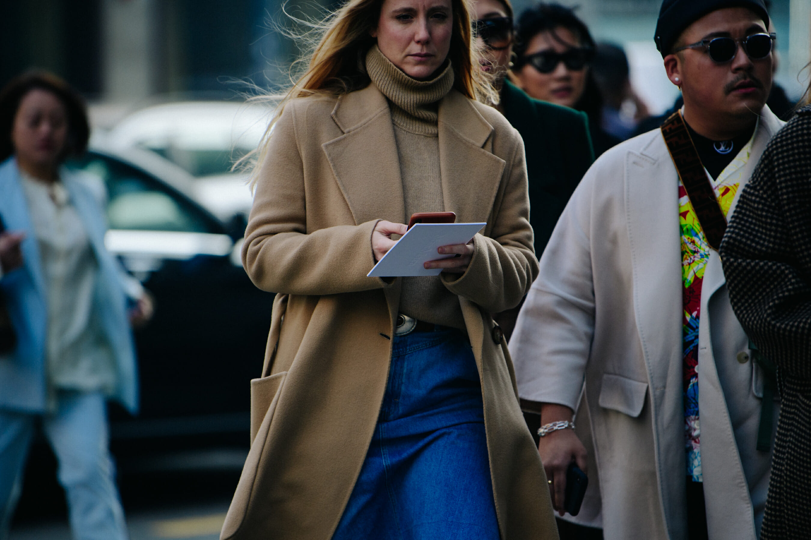 Woman wearing tan wool coat