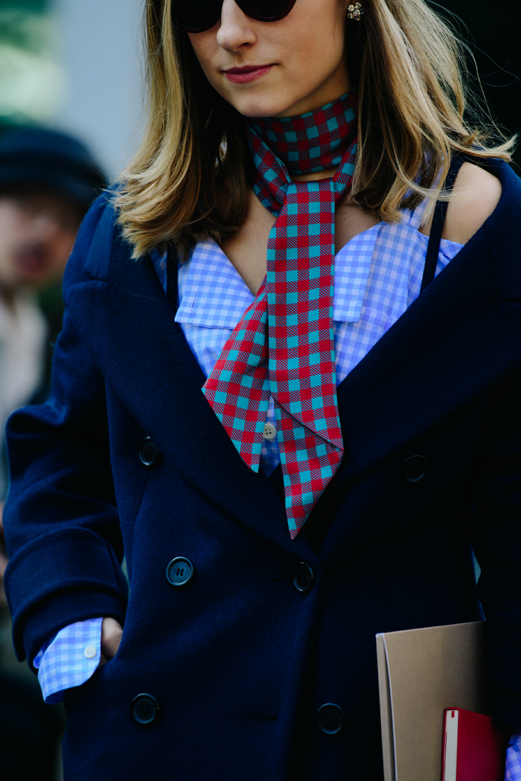 Woman wearing check tie
