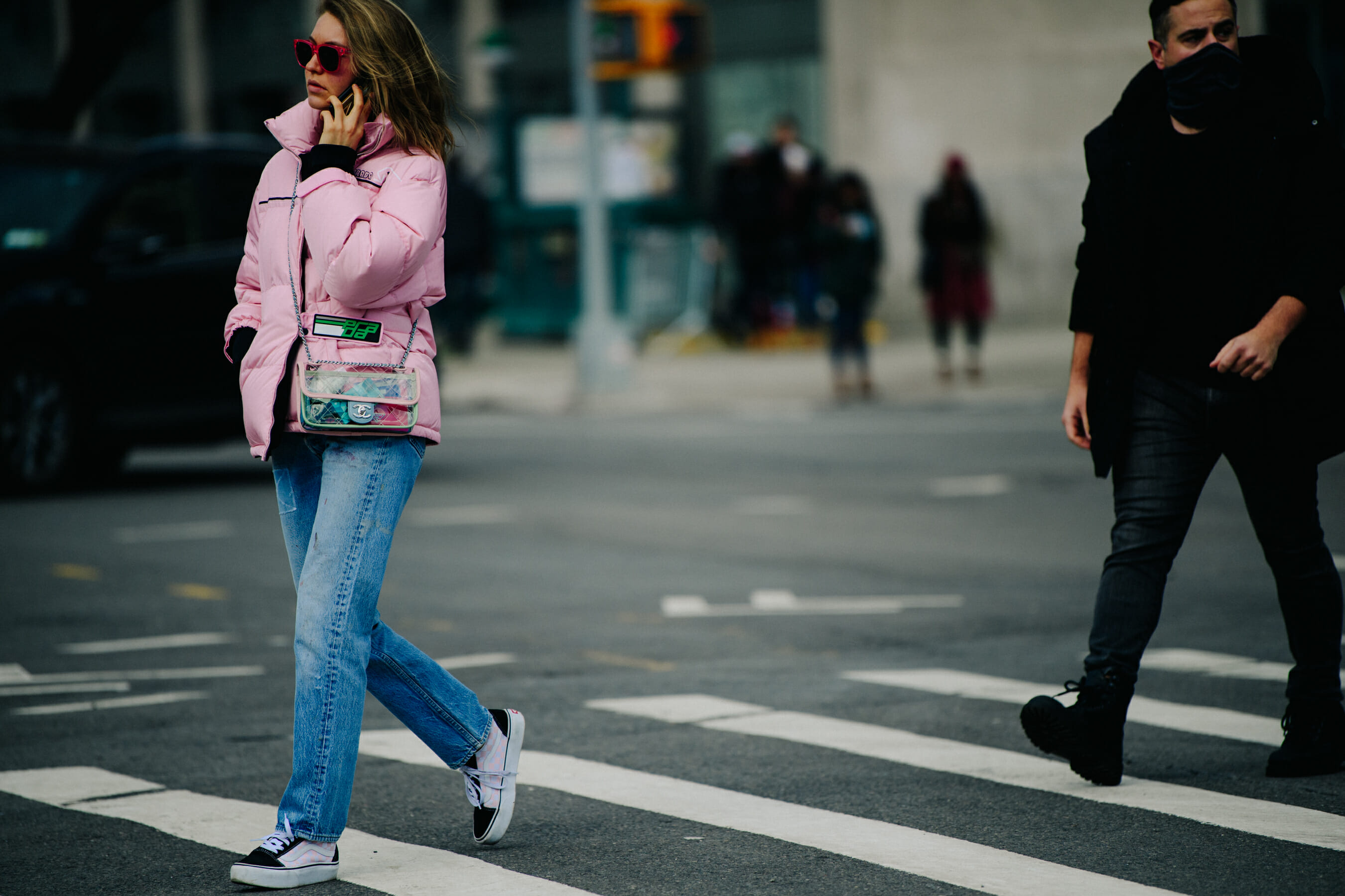 Woman wearing pink Prada jacket