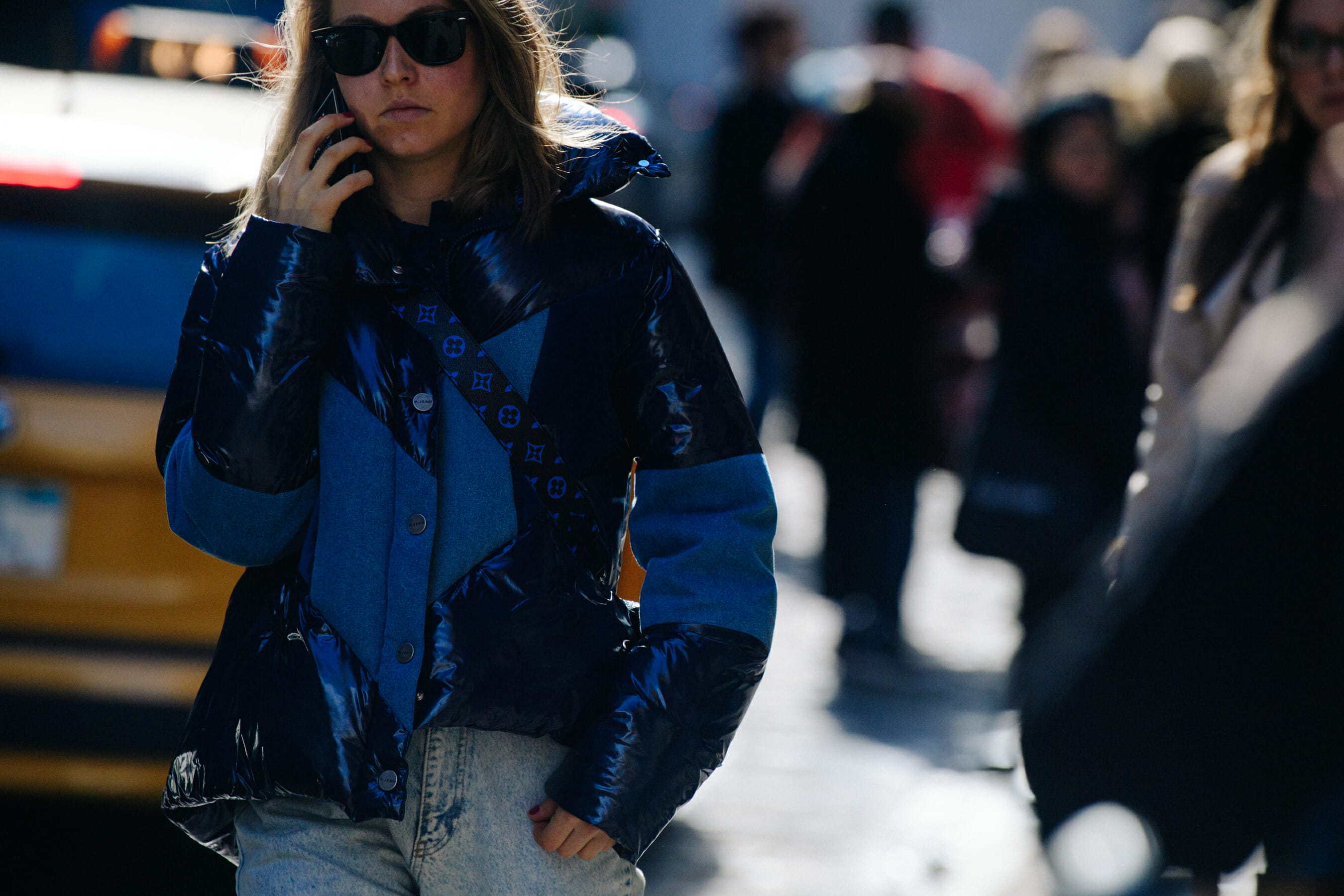 Woman wearing Louis Vuitton bag