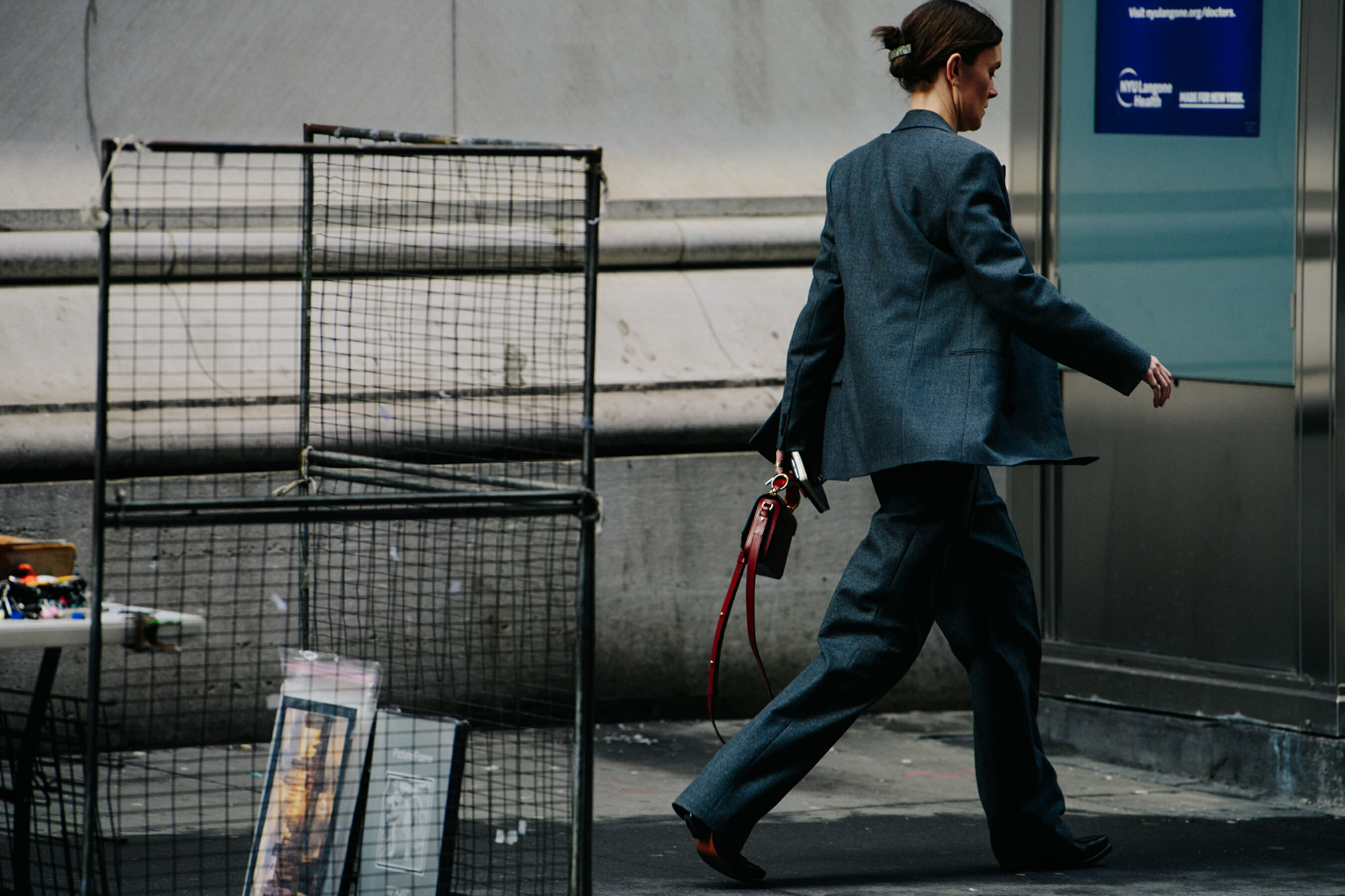 Editor wearing grey suit