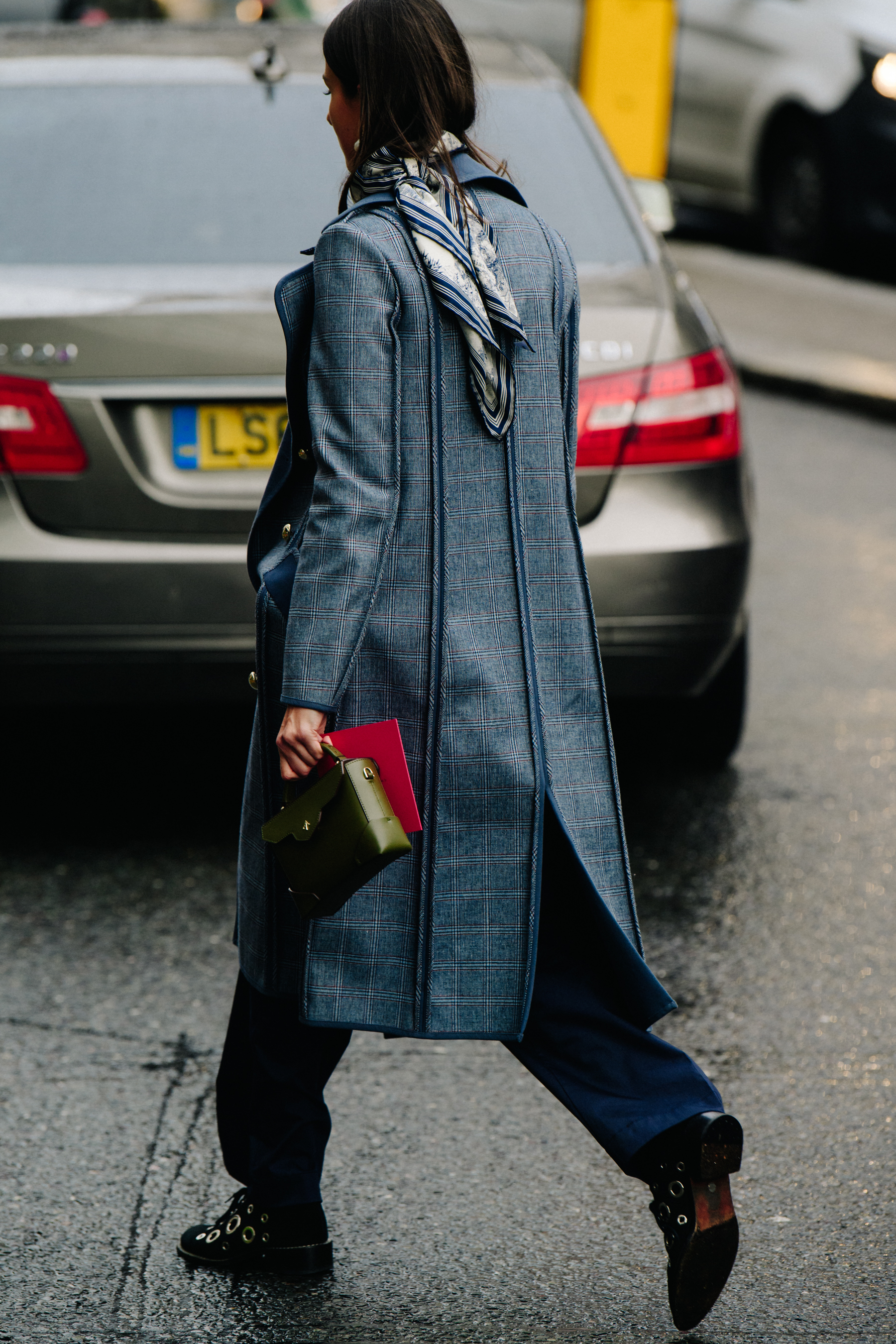 Woman wearing check coat