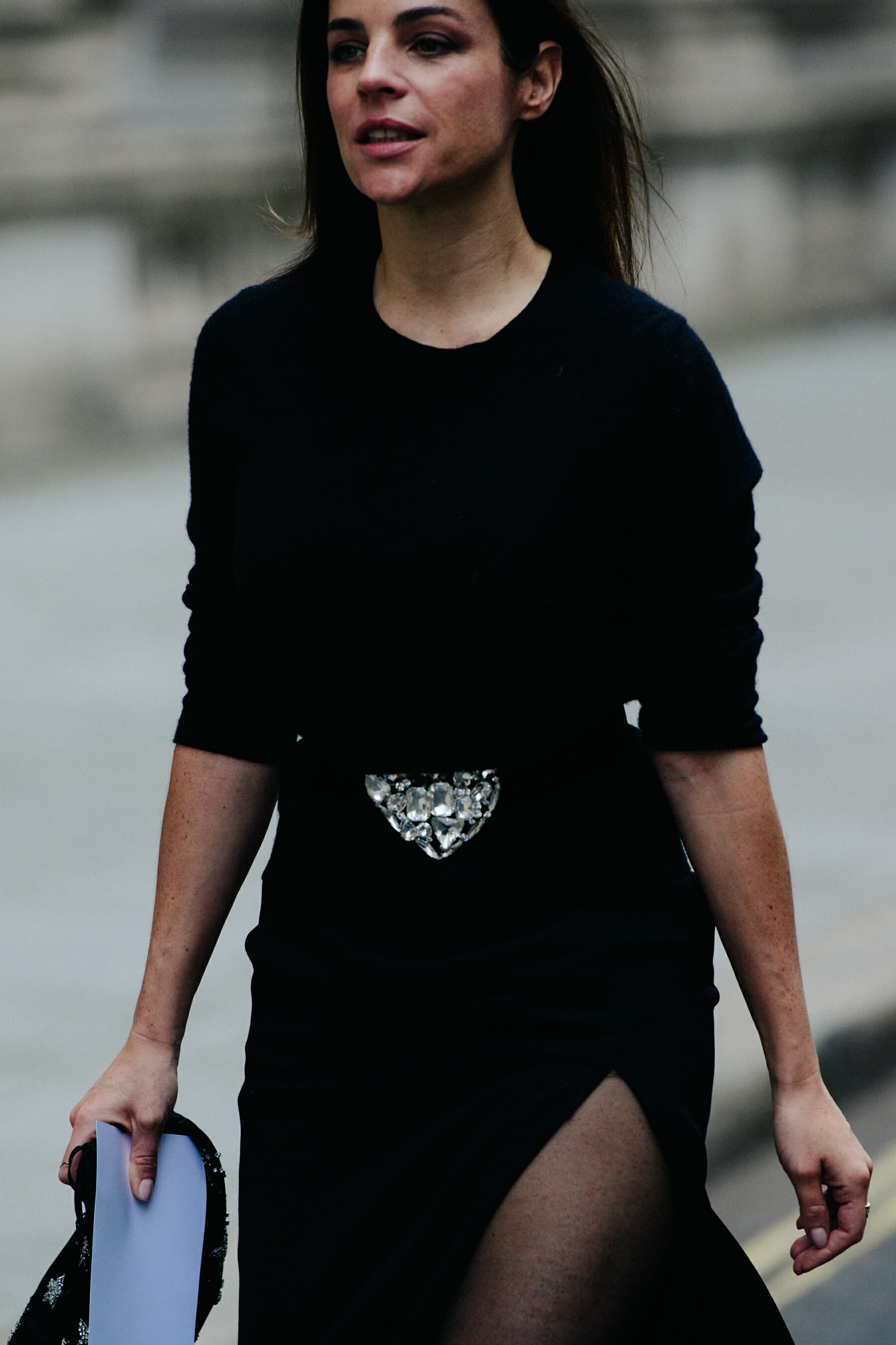 French woman wearing black dress