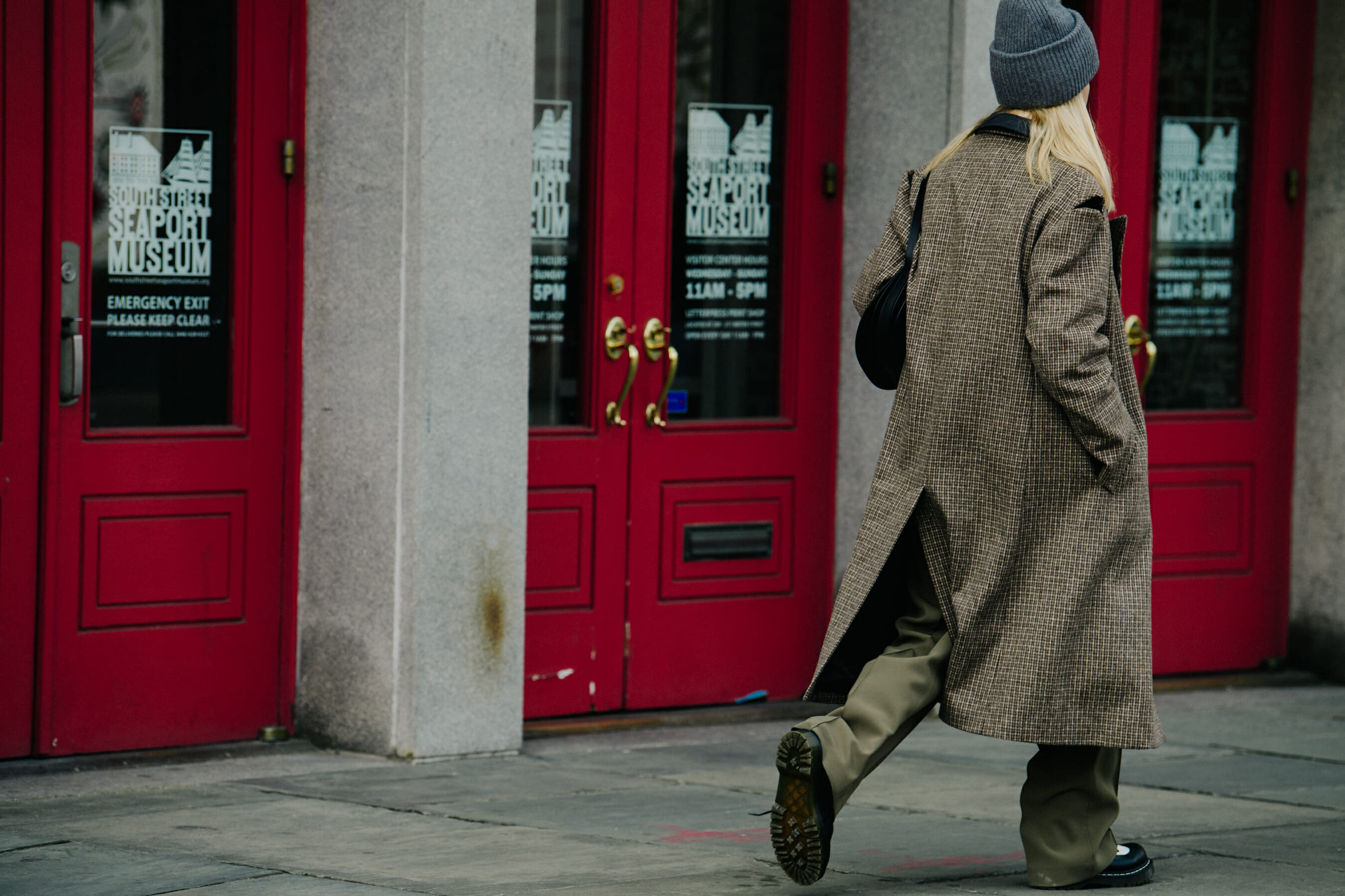Woman wearing brown coat