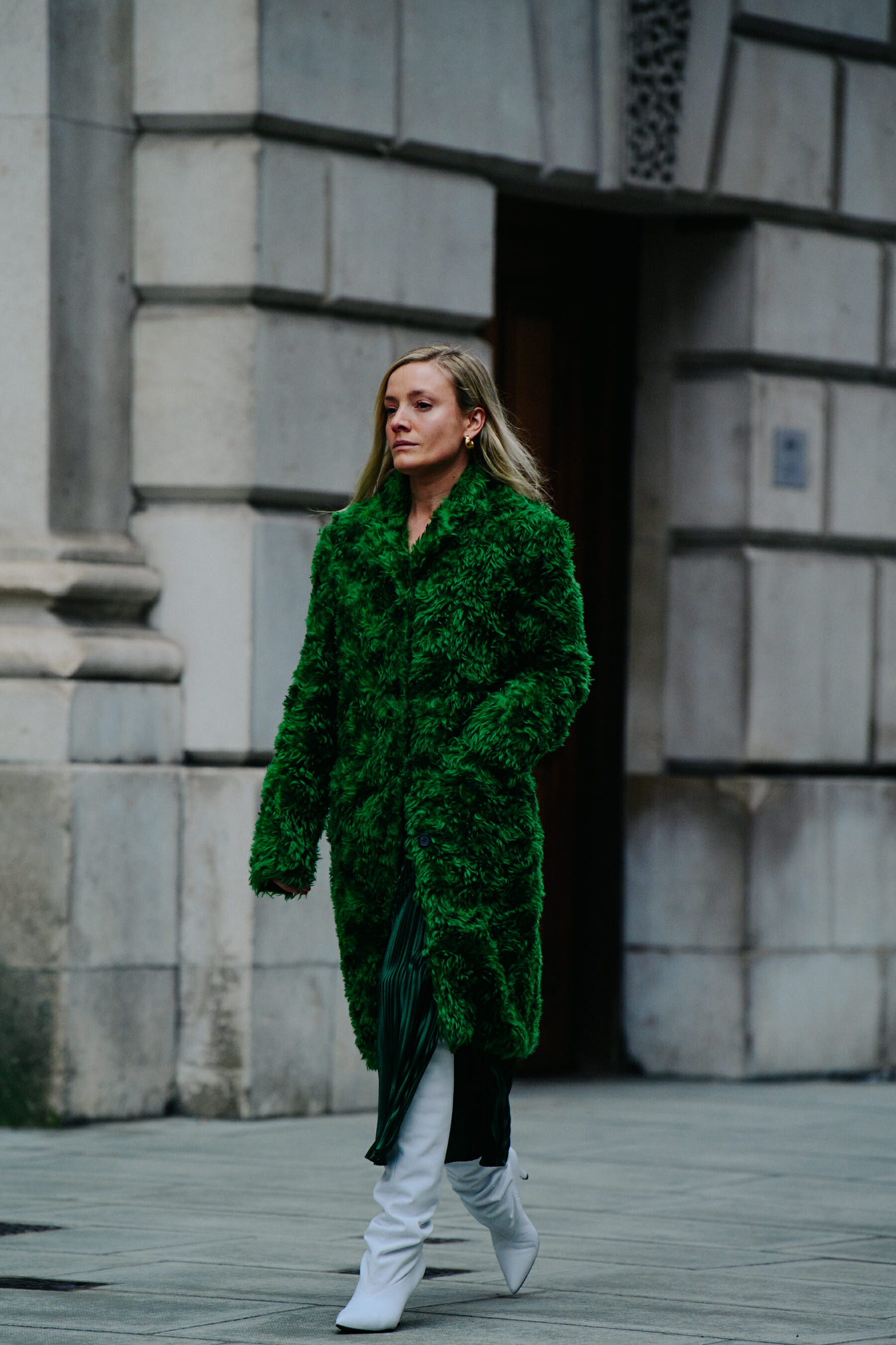 Woman wearing green coat