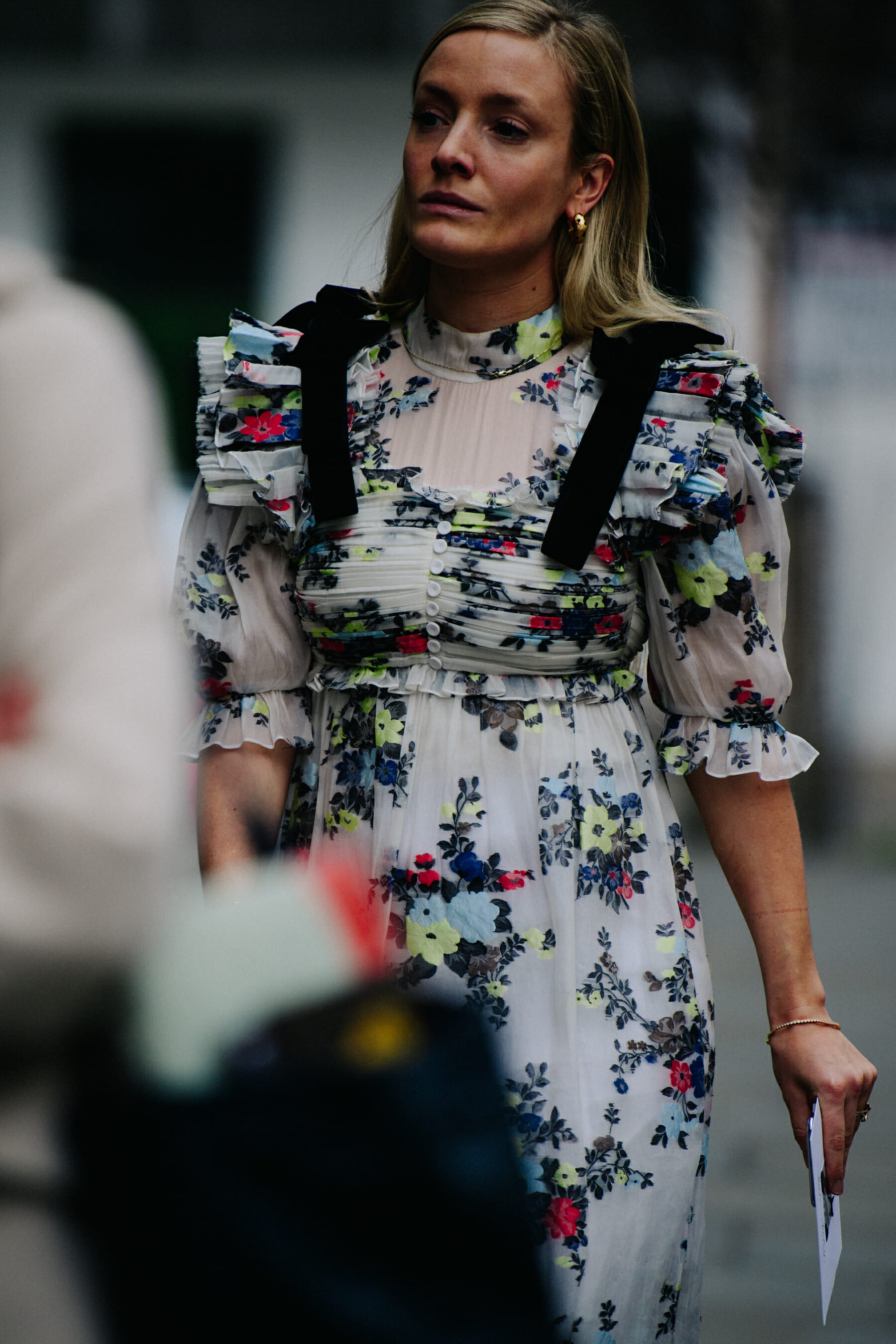 Woman wearing white floral dress
