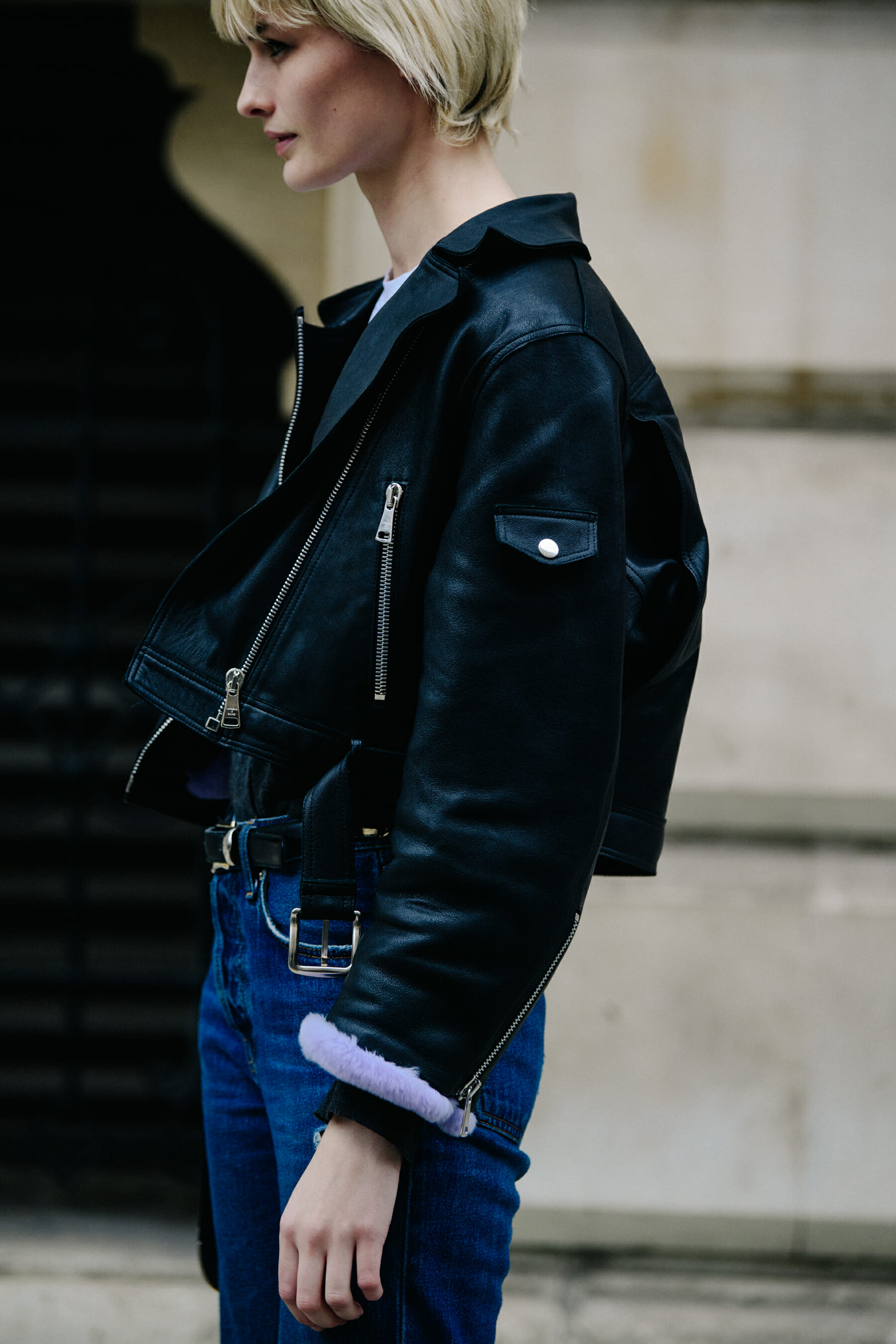 Model wearing leather jacket