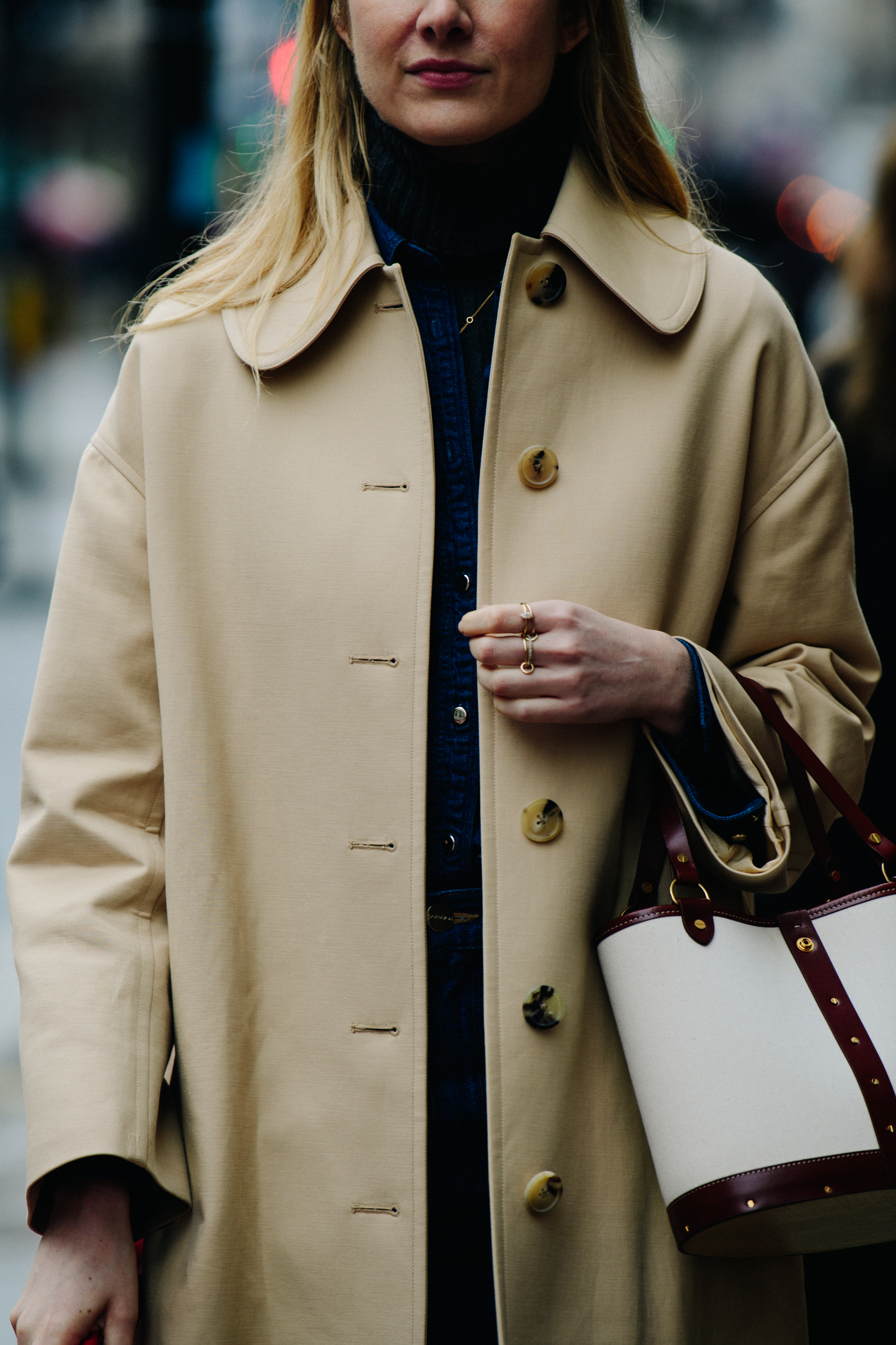 Woman wearing tan coat