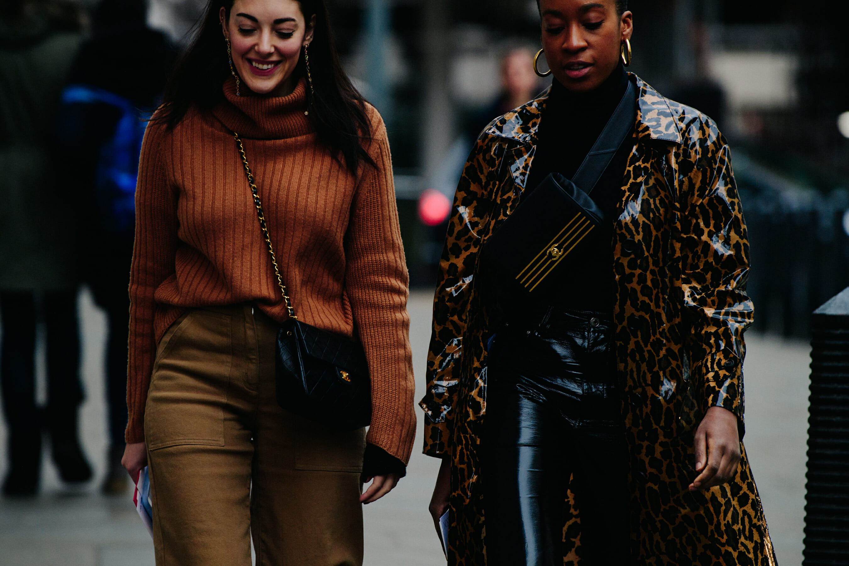 Two women wearing brown