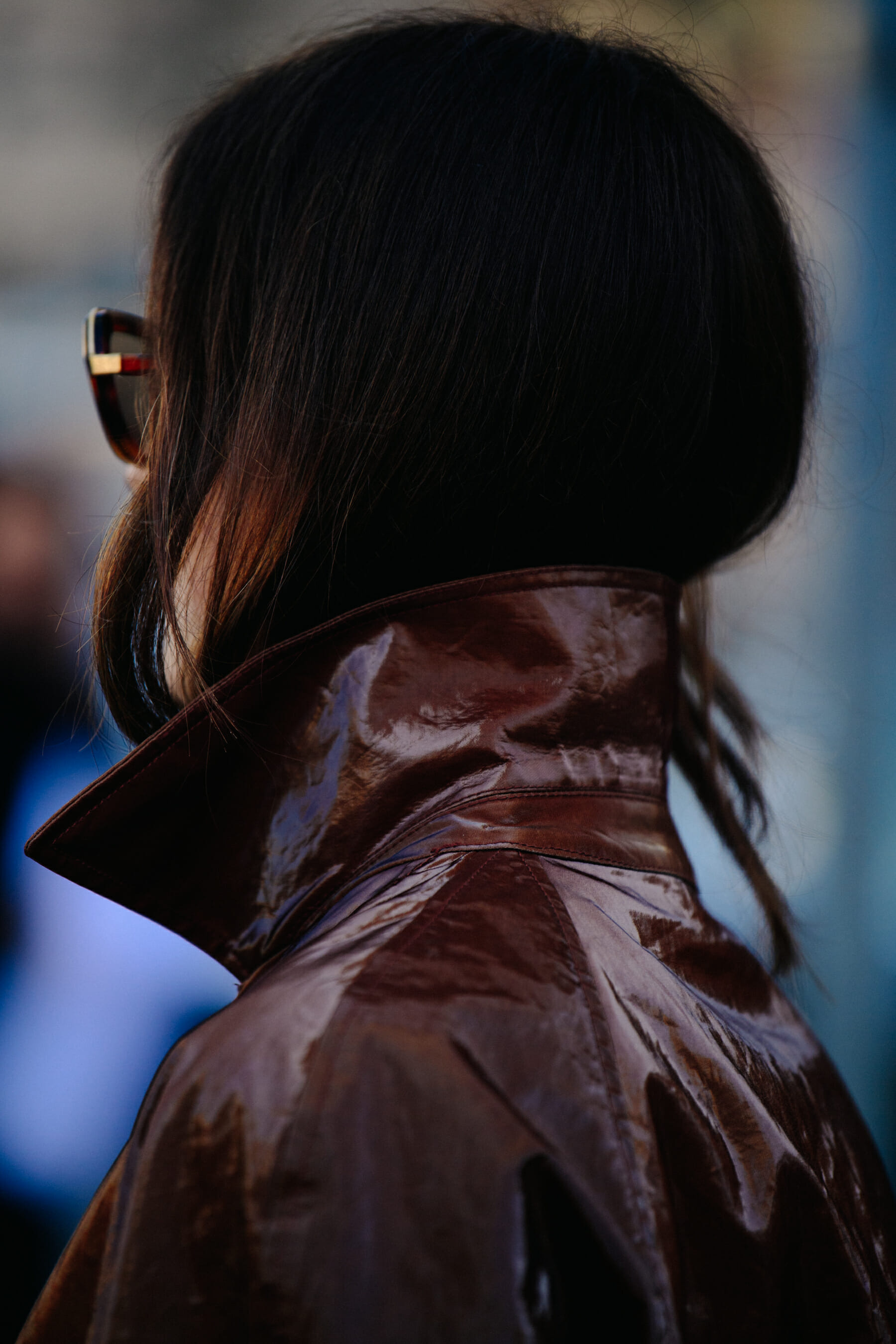Woman wearing brown leather jacket