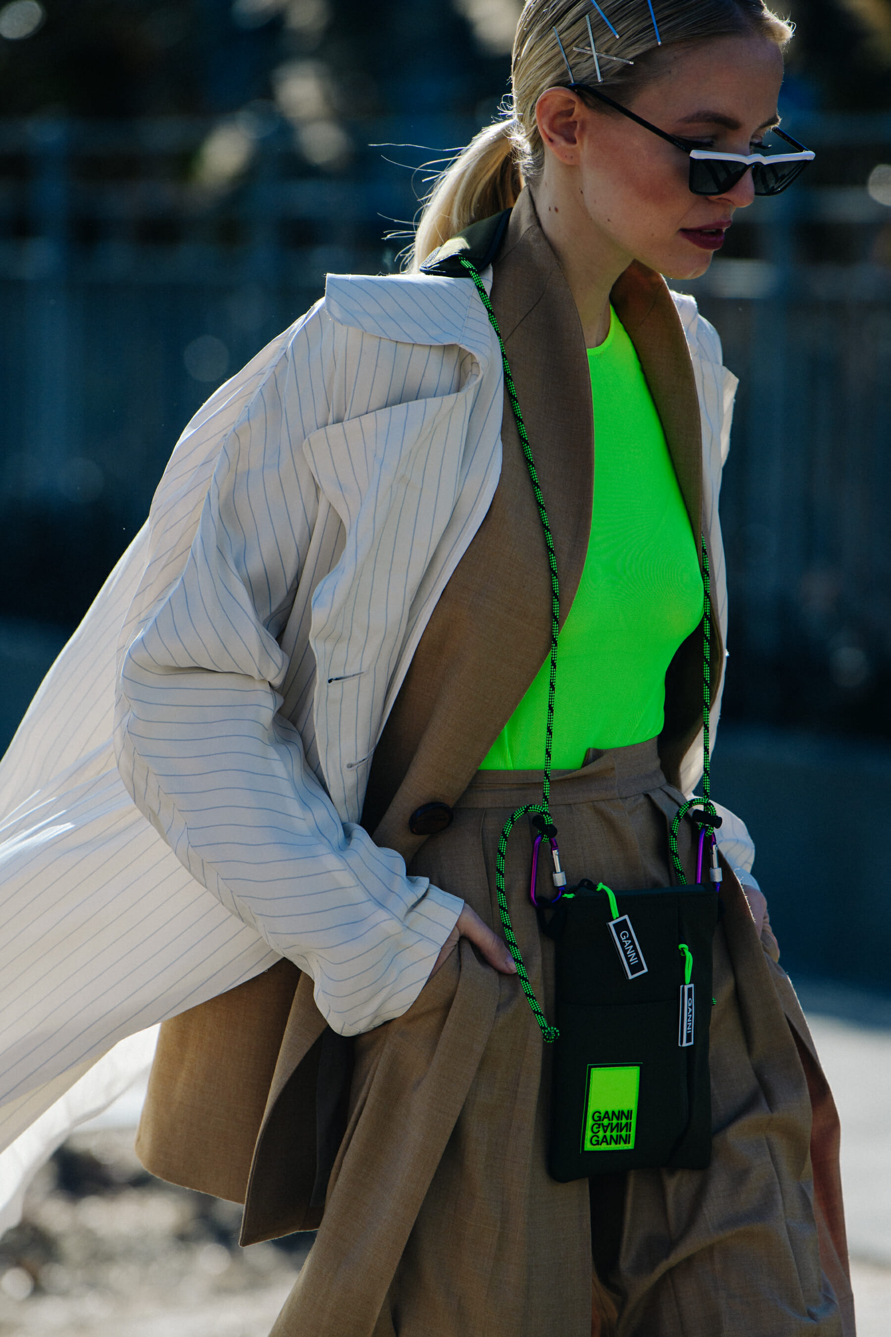 Woman wearing Ganni bag