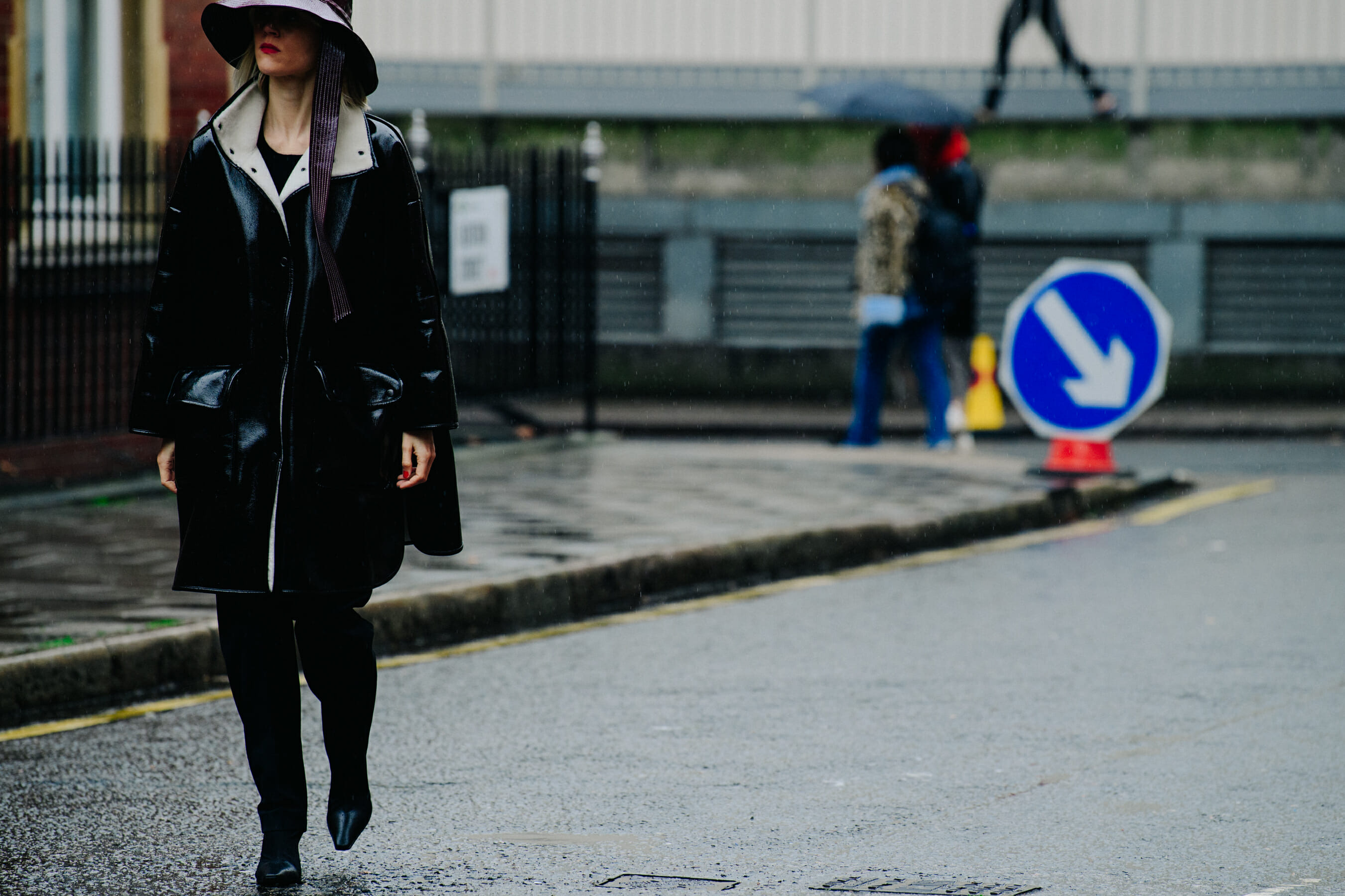 Woman wearing black leather coat