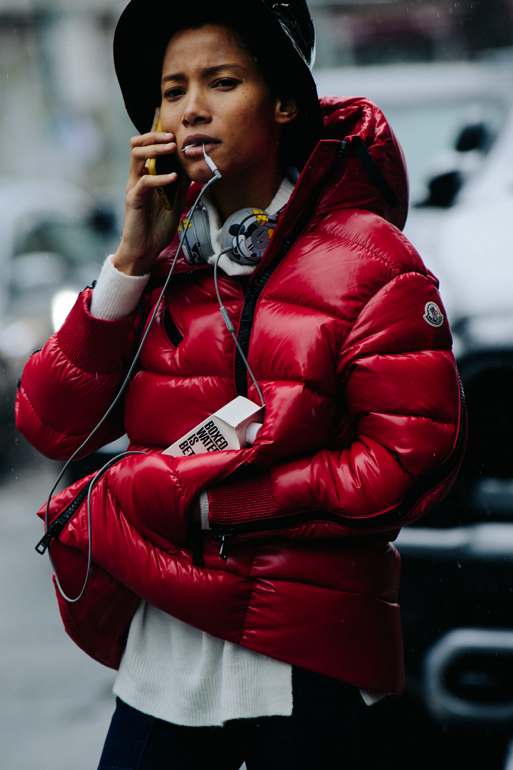 Model wearing red Moncler jacket