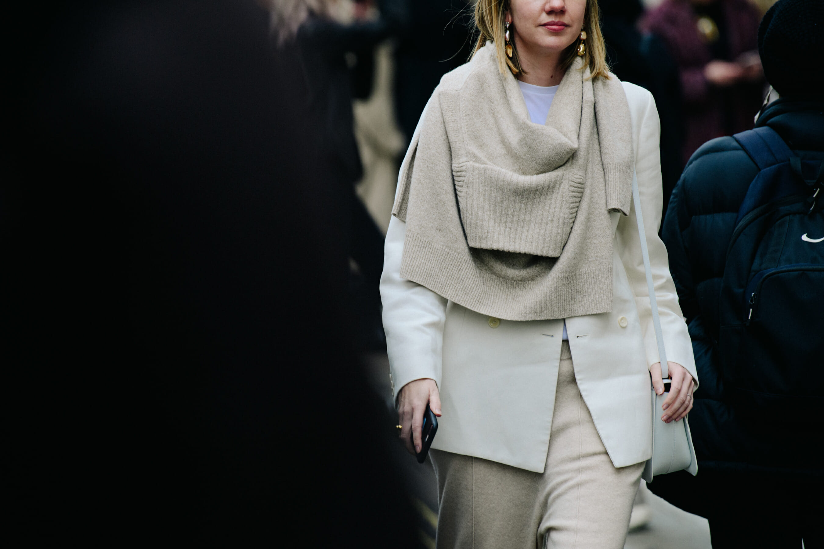 Woman wearing white suit
