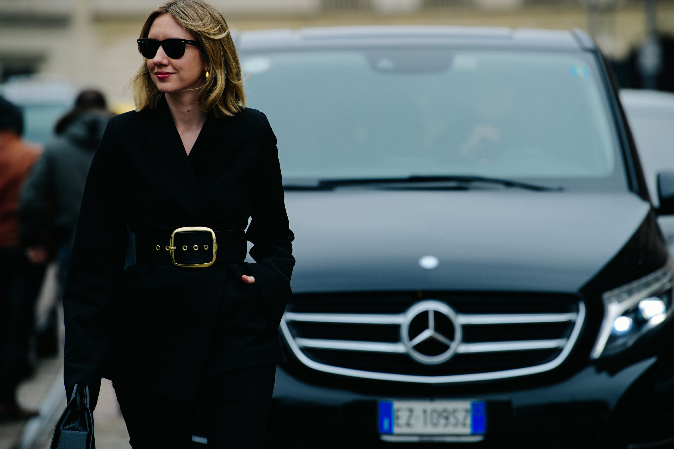 Woman wearing black suit