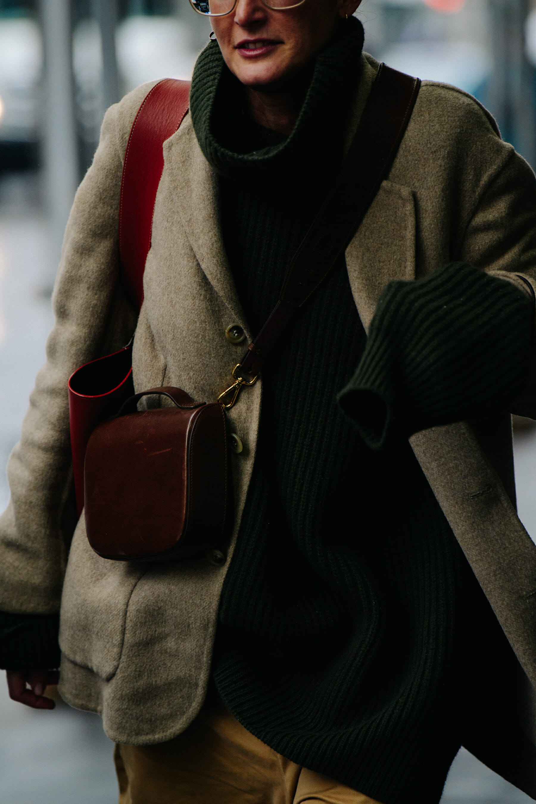 Woman wearing green wool jumper
