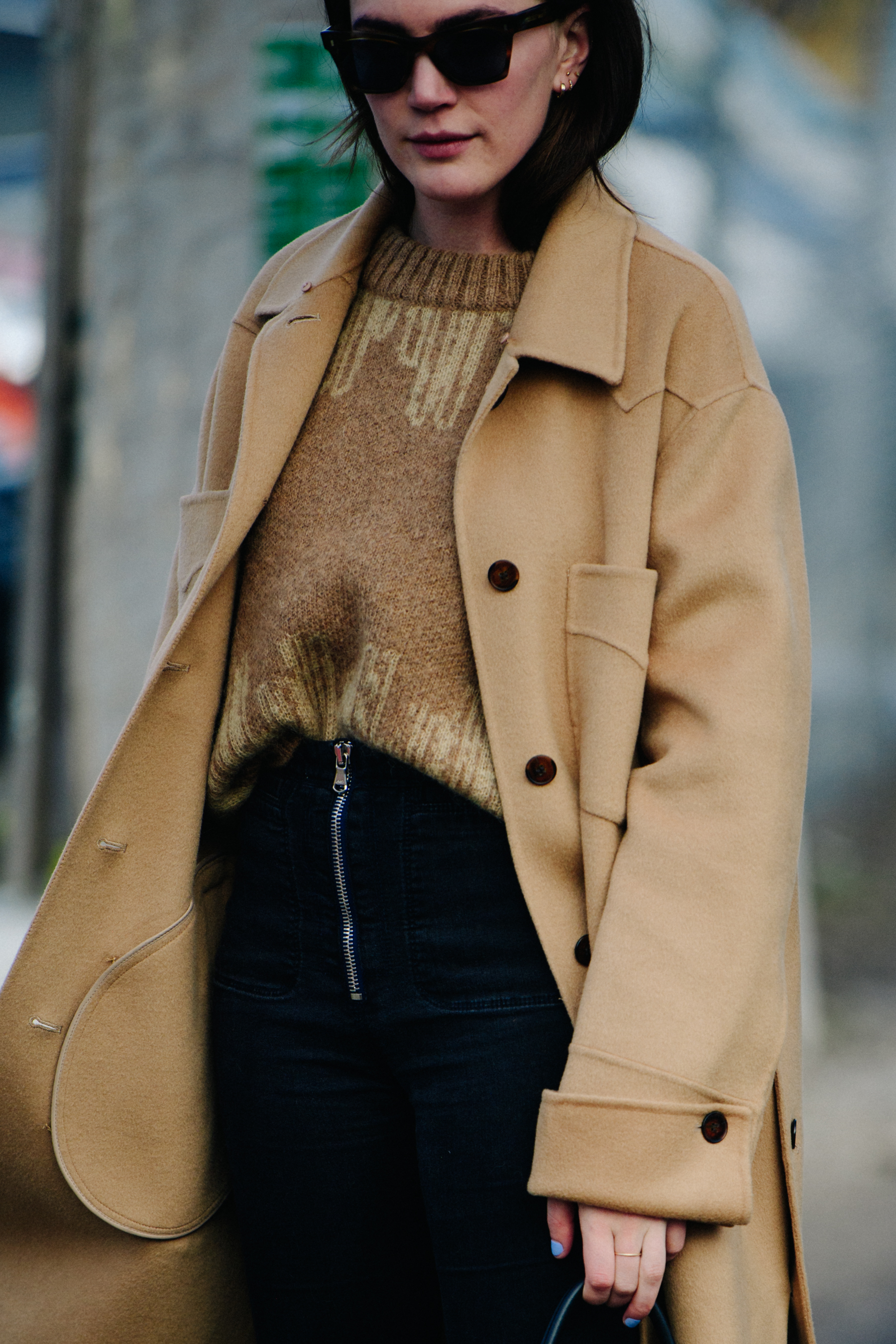 American blogger wearing beige