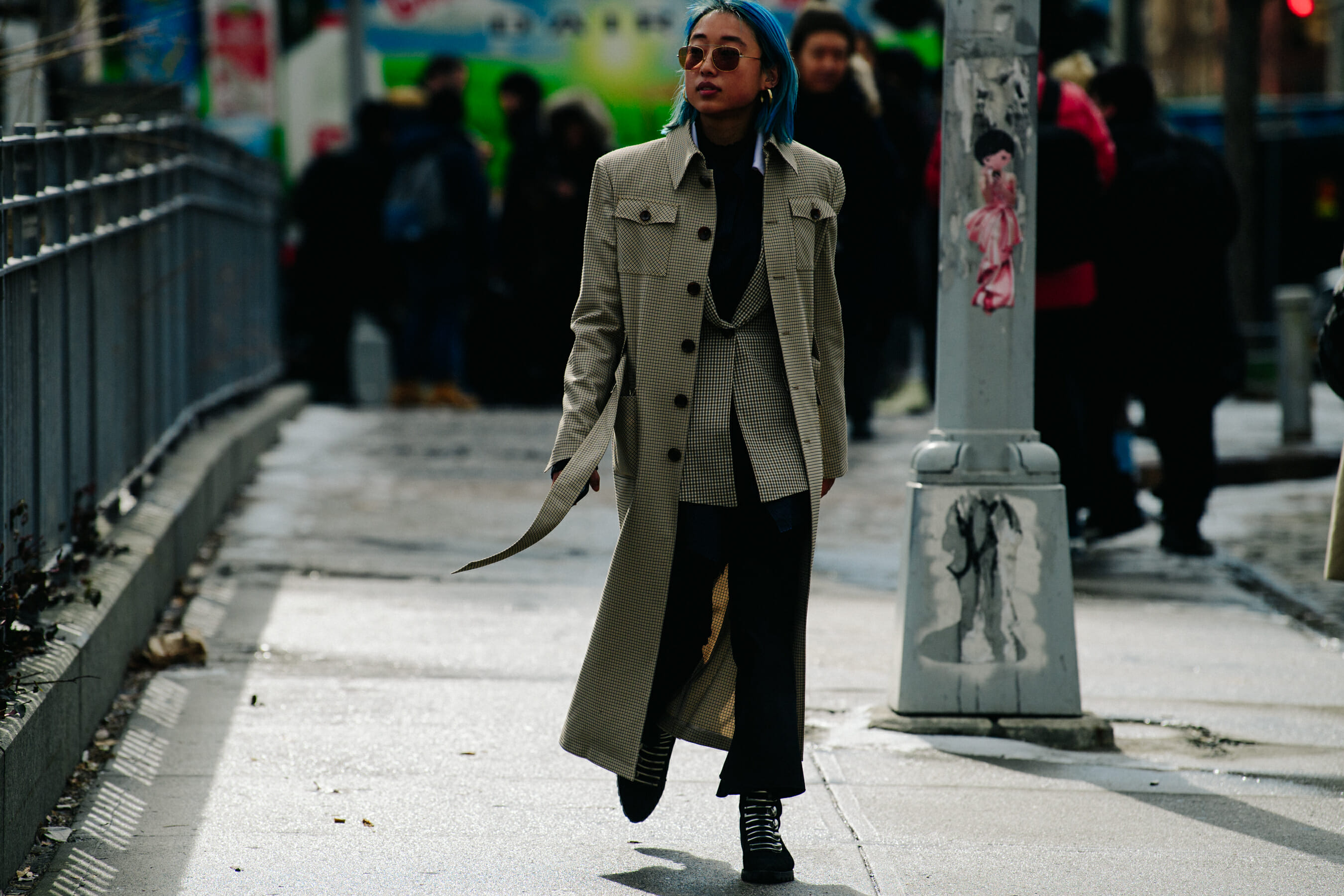 Woman wearing long check coat