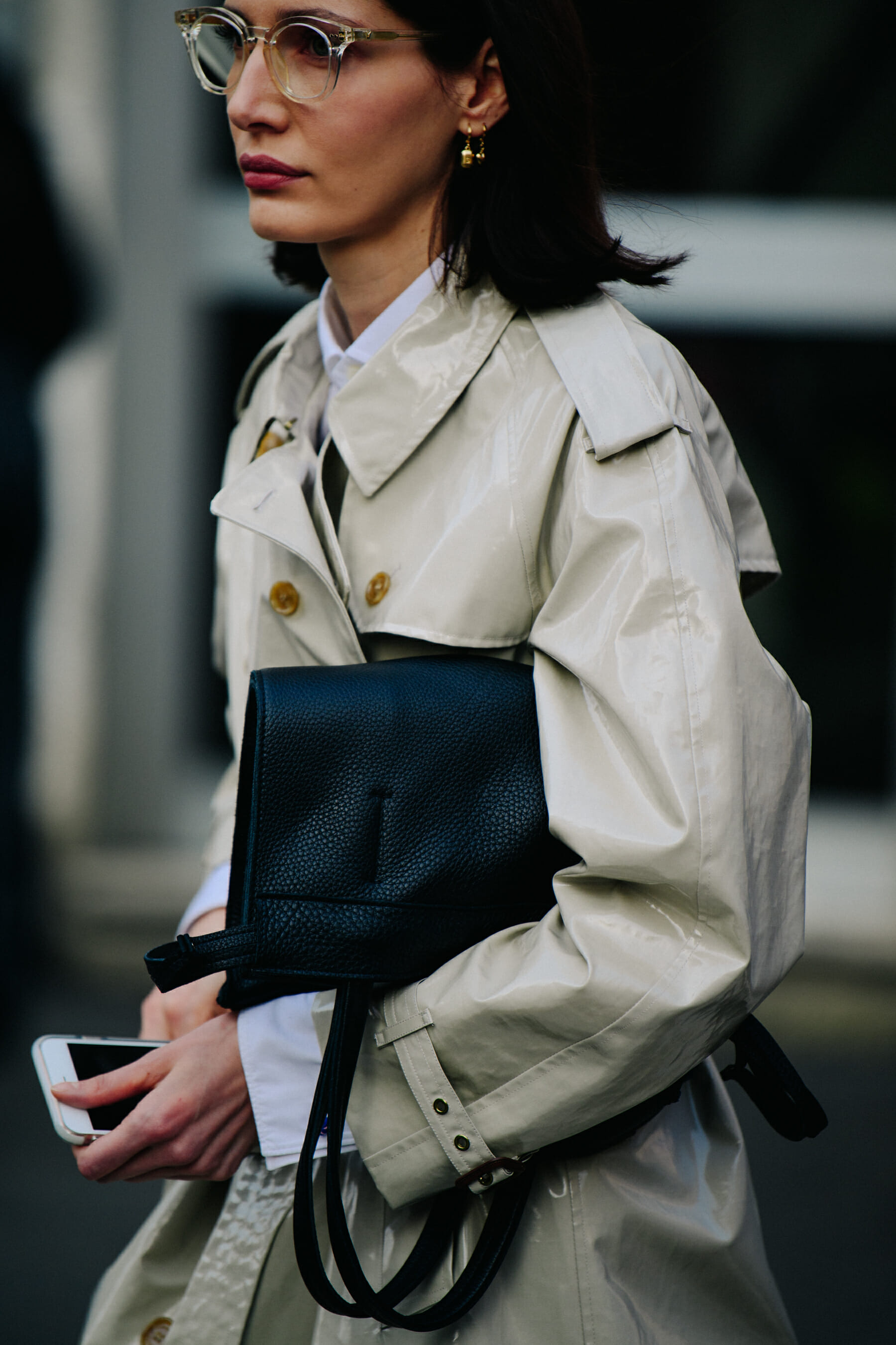 Woman wearing light trench coat