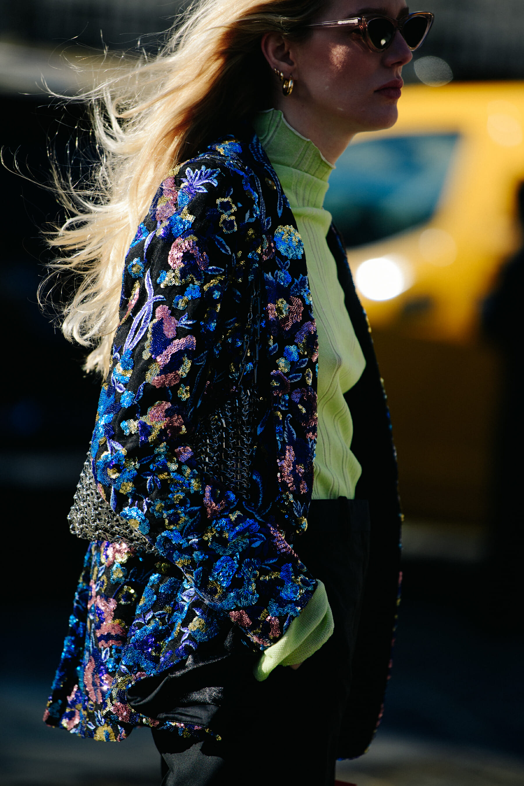 Woman wearing blue floral coat