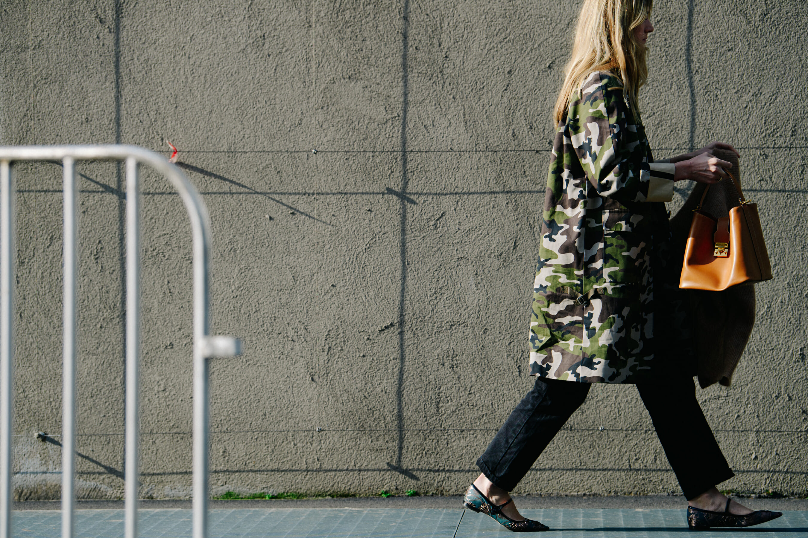 Woman wearing camouflage coat