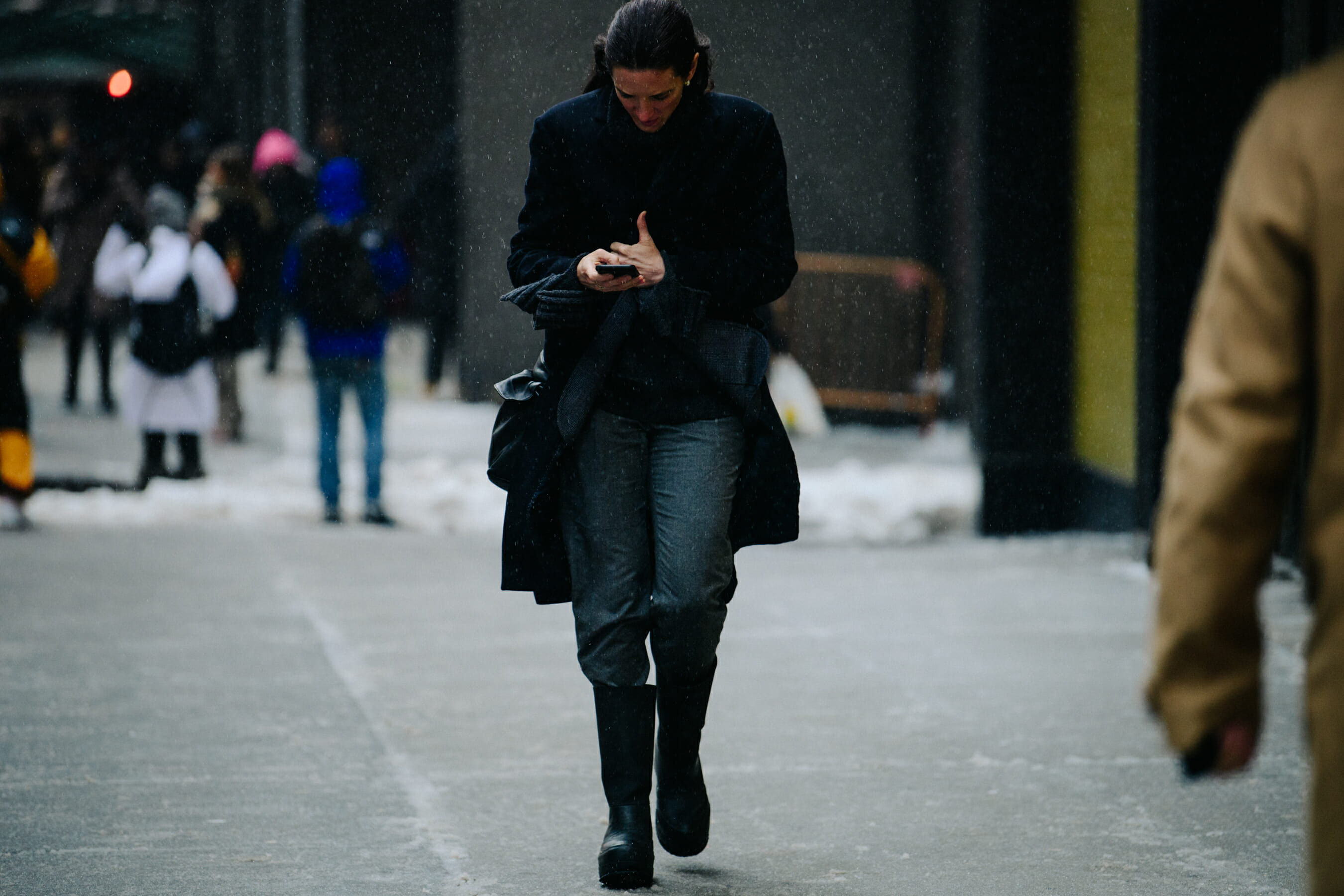 Woman wearing dark outfit