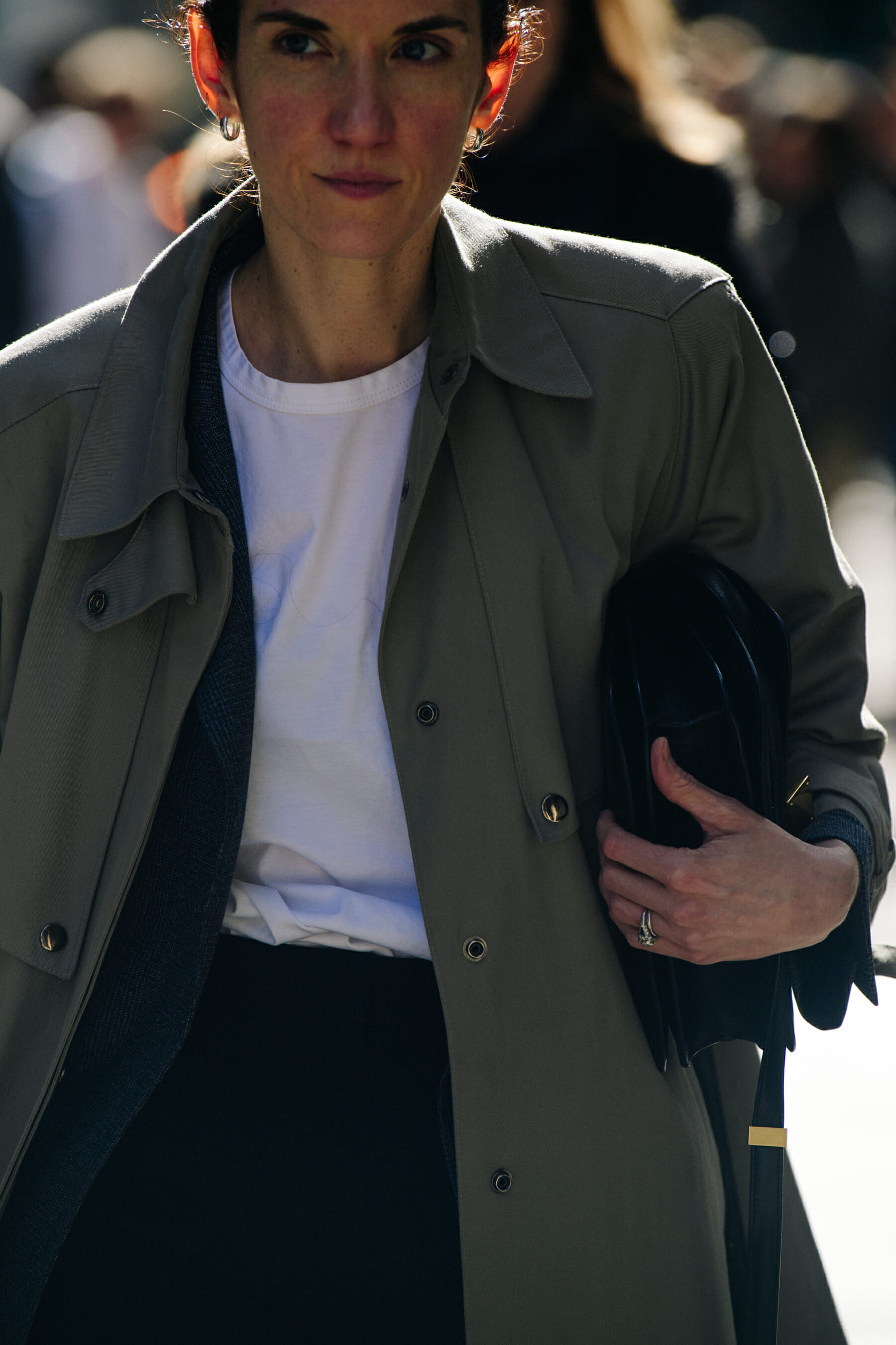 Woman wearing light grey coat