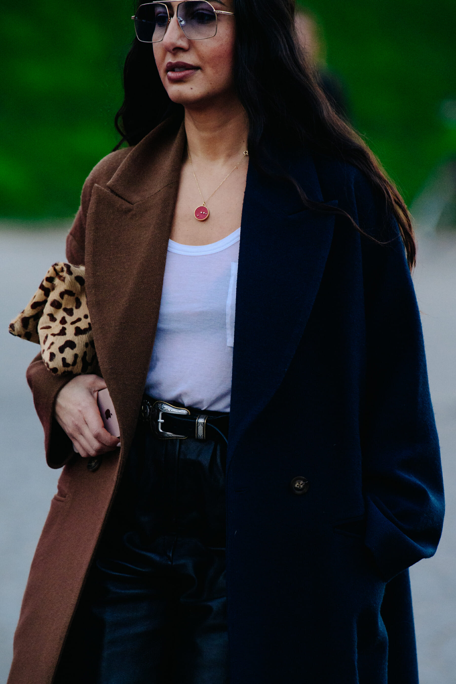 Woman wearing brown and black coat