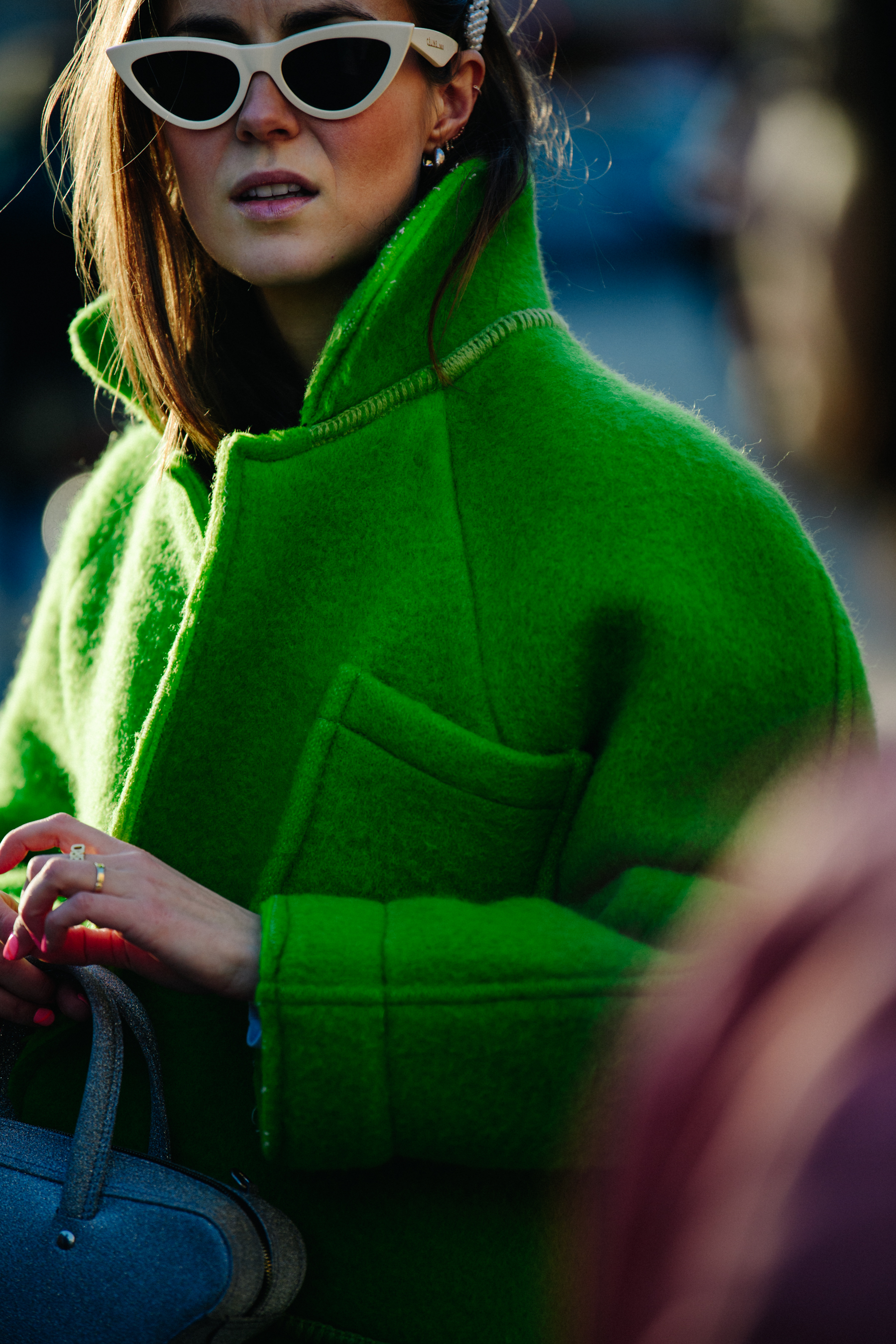 Woman wearing green jacket