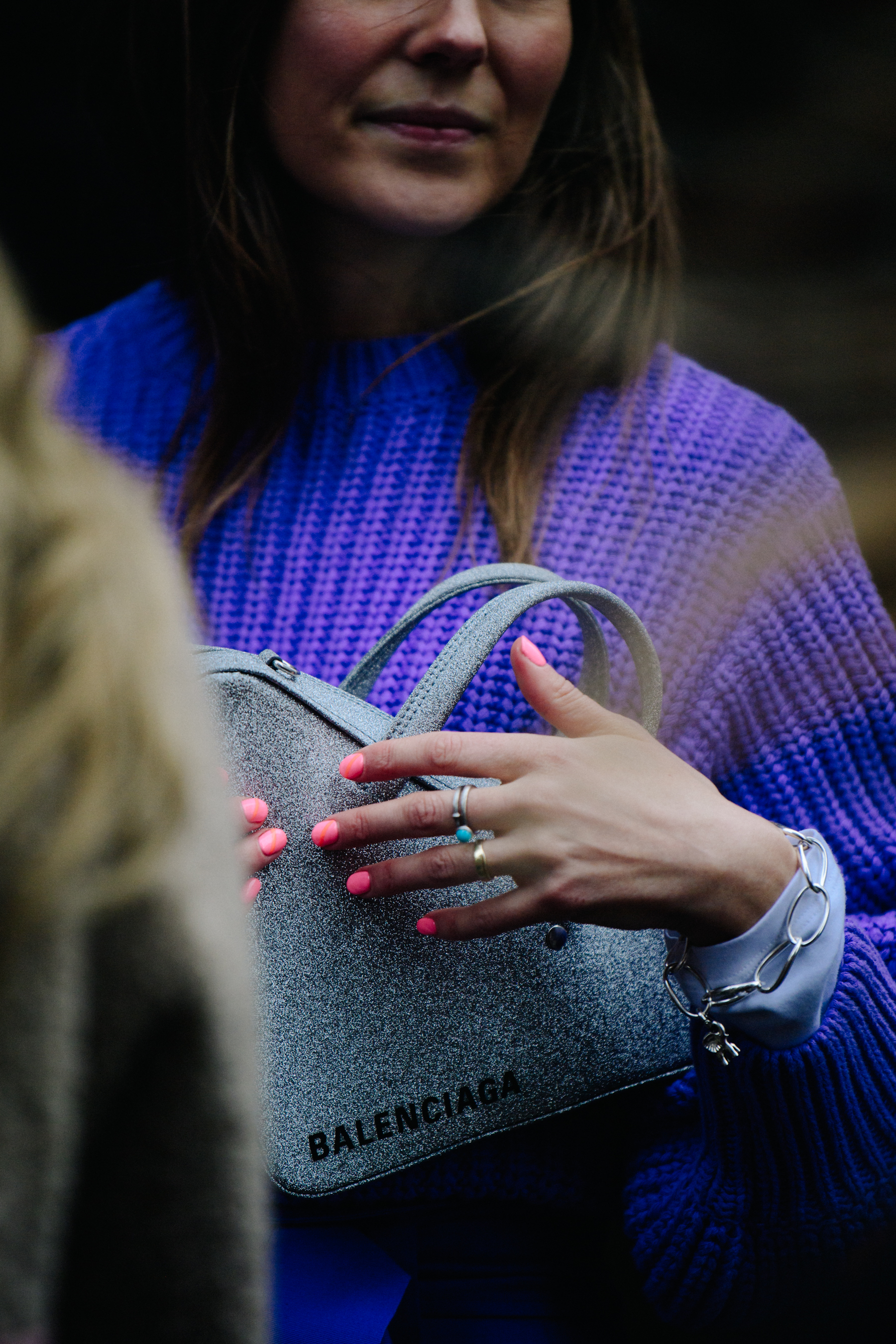 Woman wearing purple wool jumper