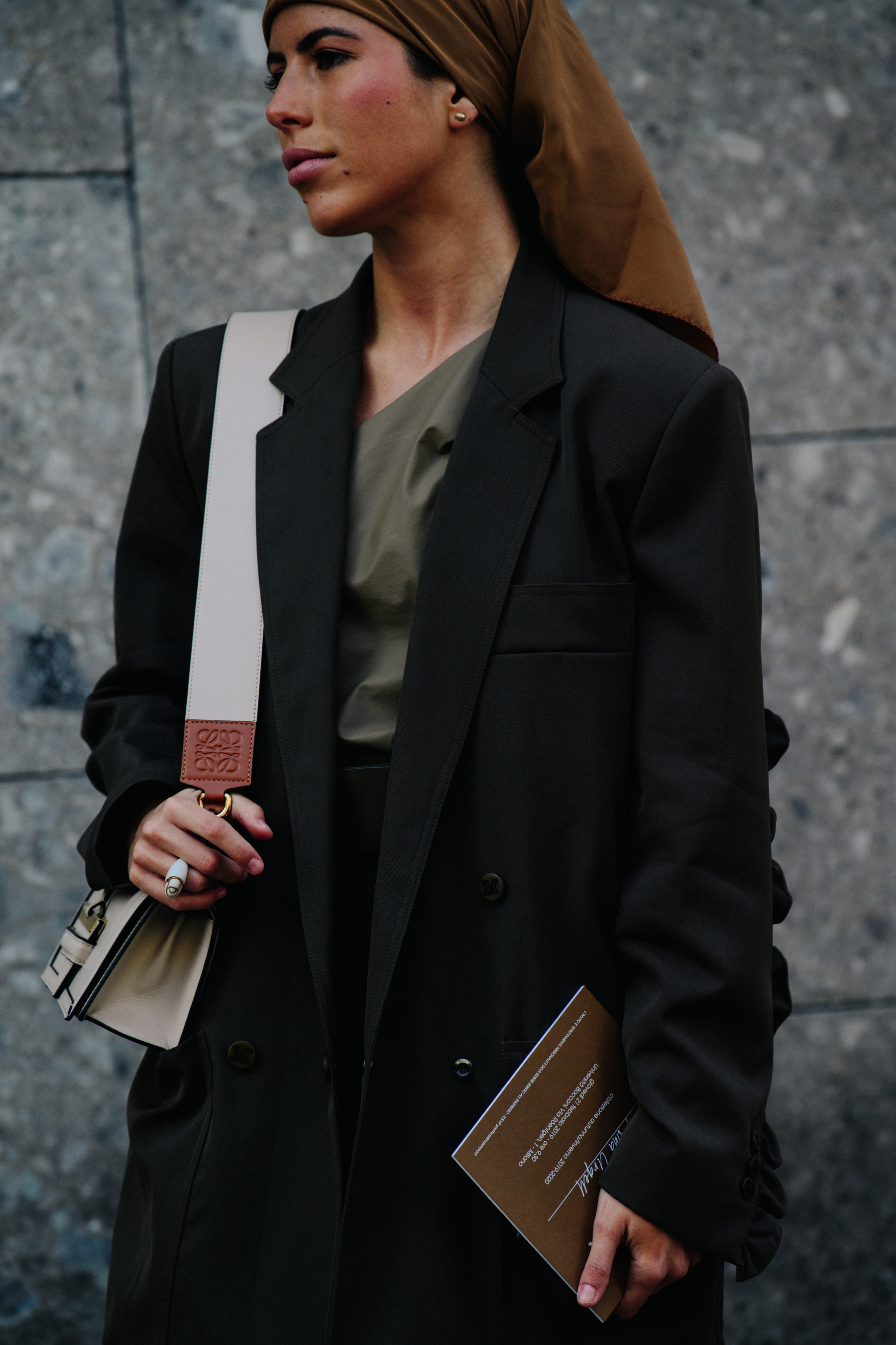 Woman wearing brown suit