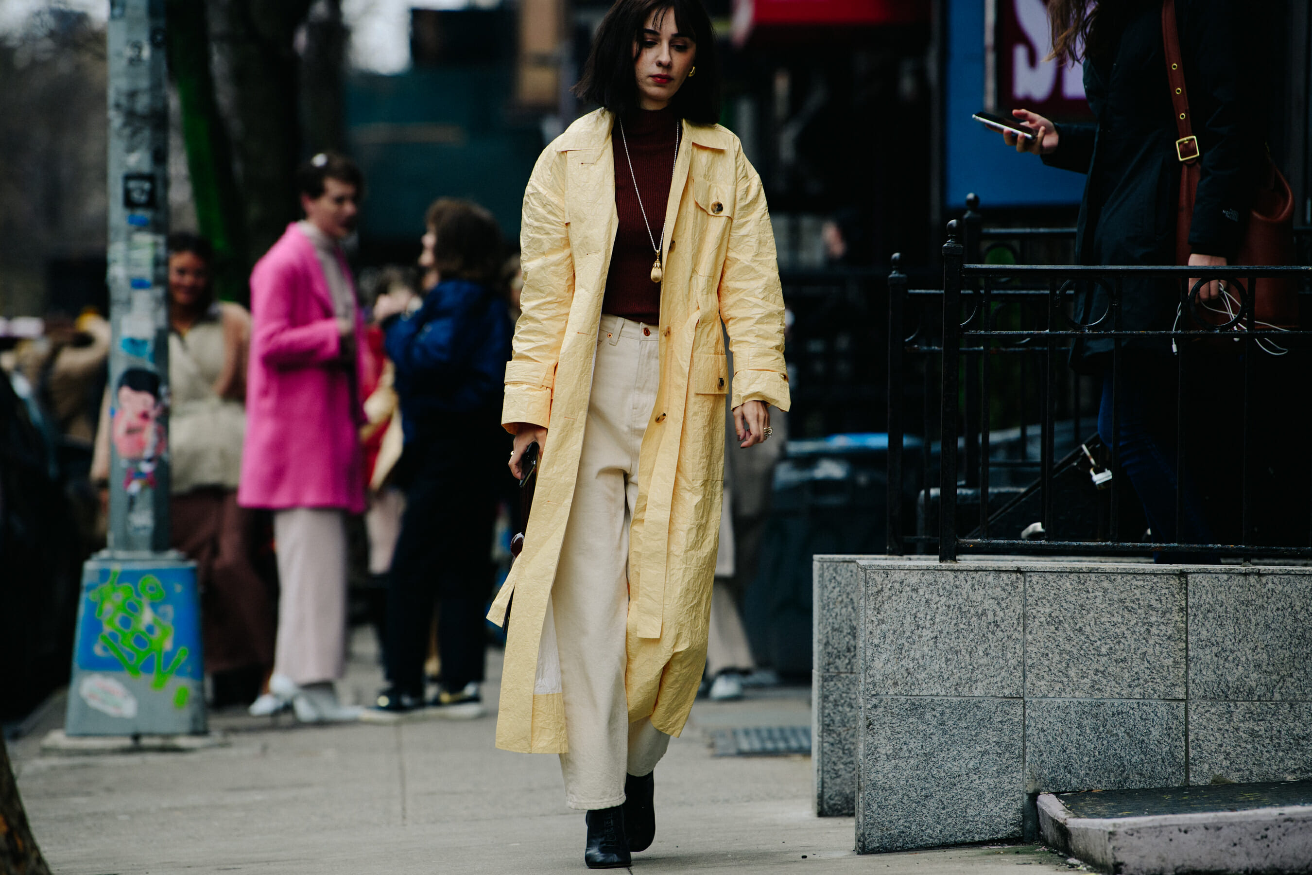 Woman wearing yellow coat