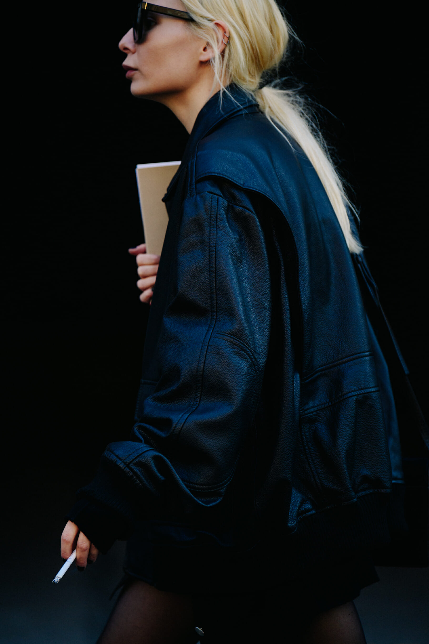 Woman wearing leather coat