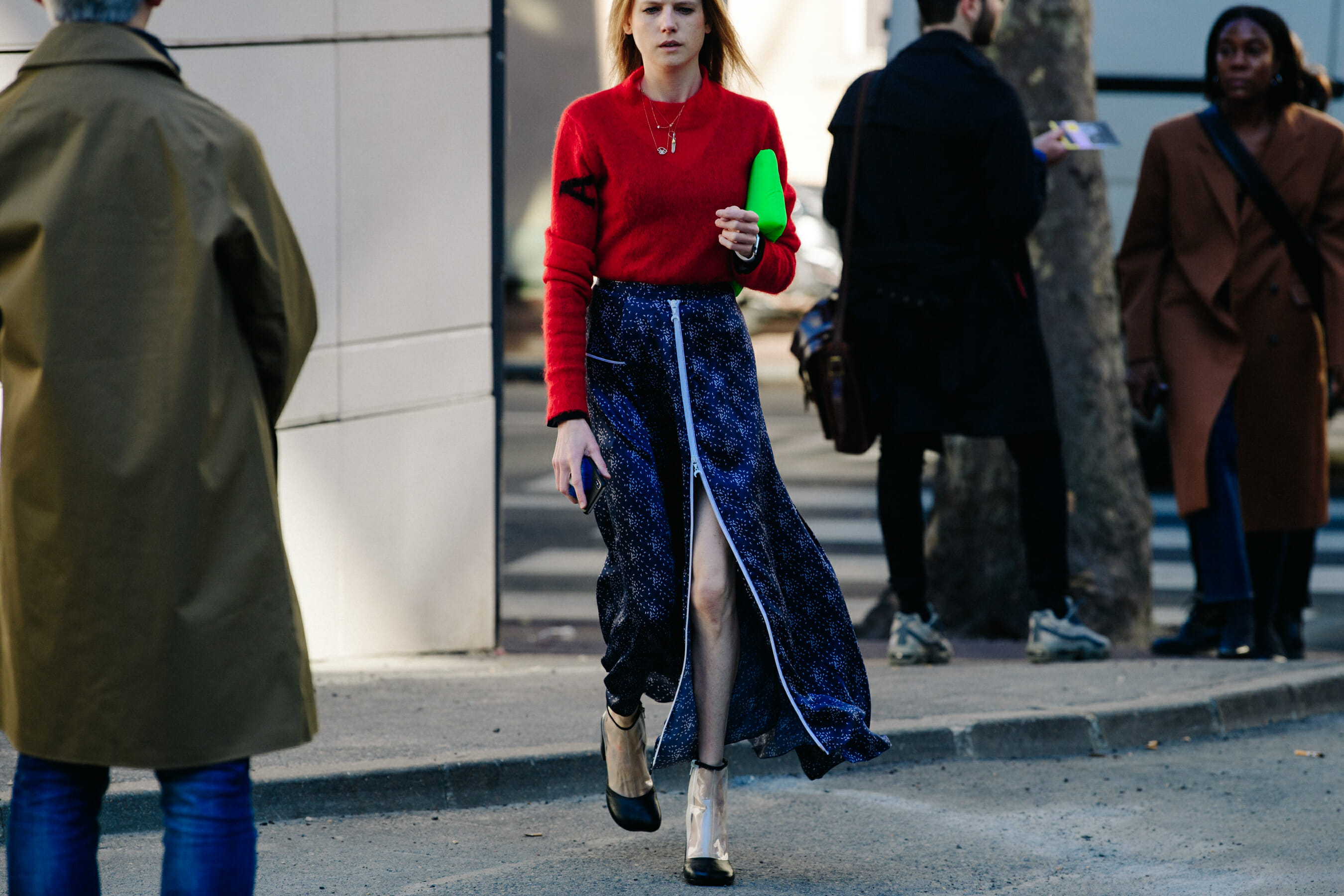 Woman wearing red jumper