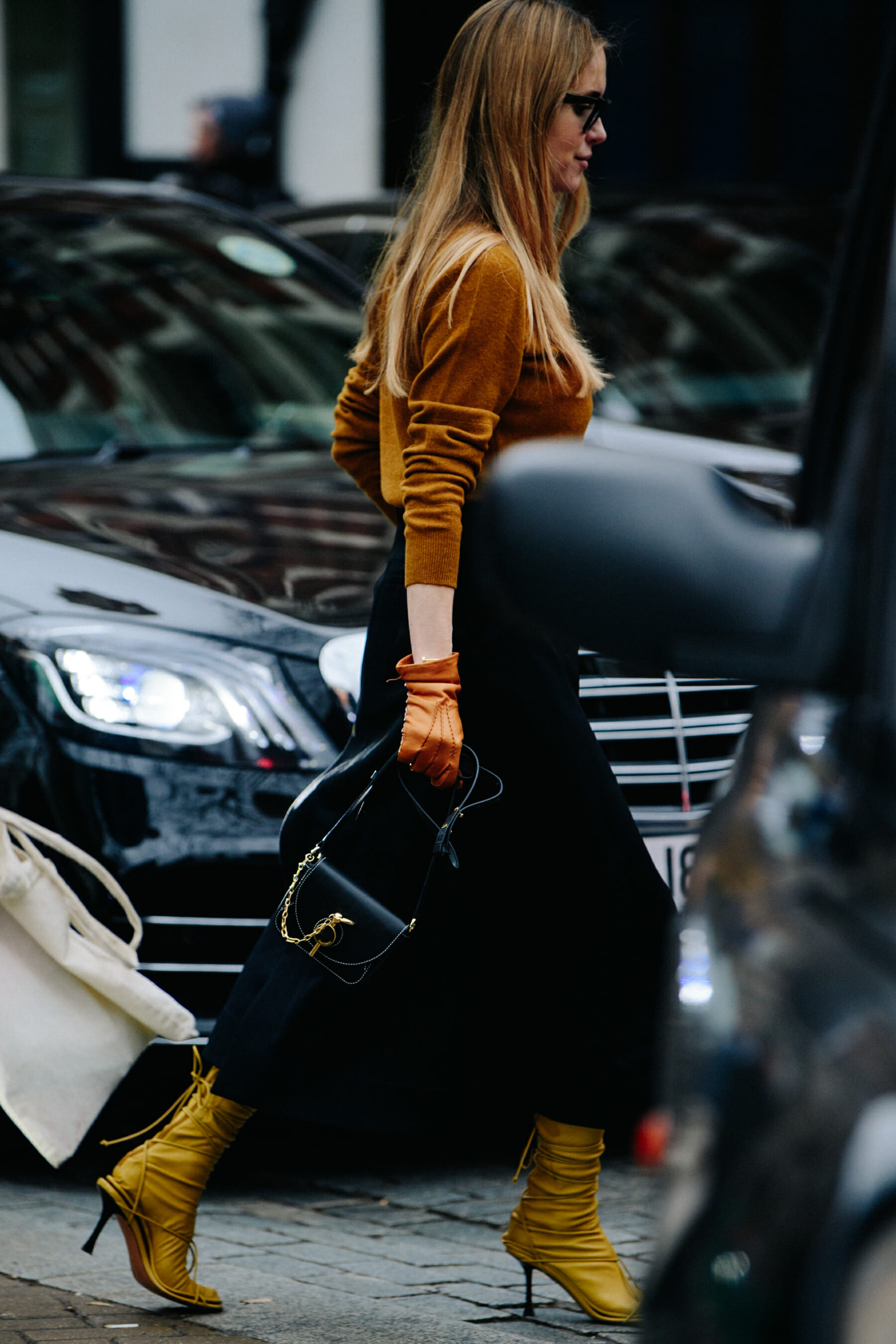 Woman wearing brown jumper