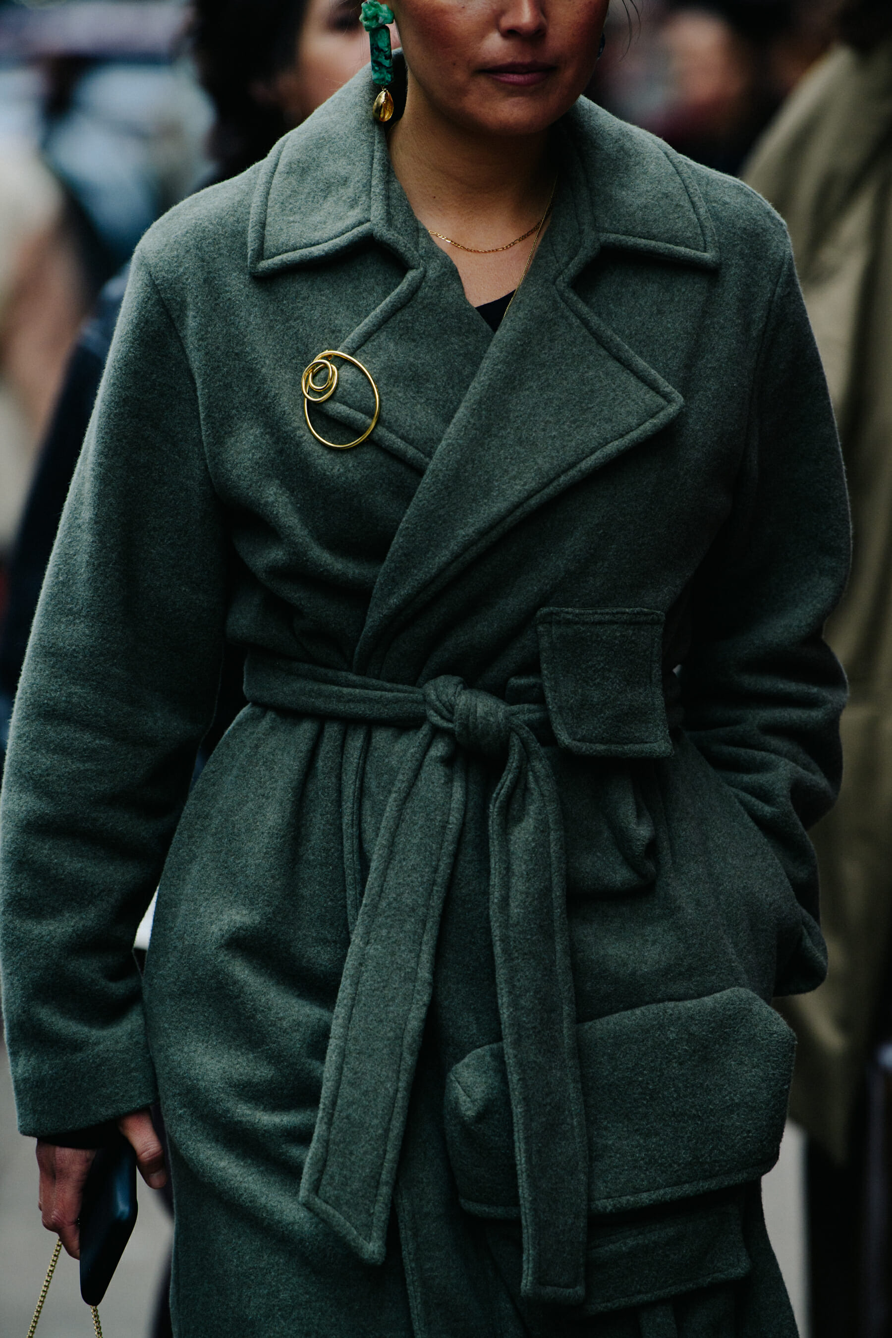 Woman wearing green coat