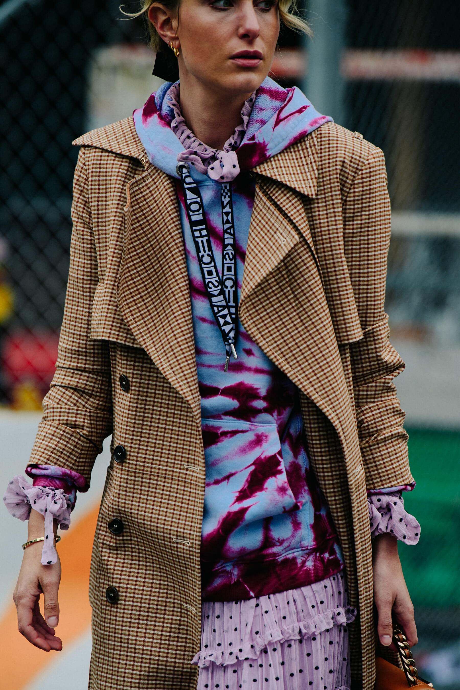 Woman wearing pink tie dye hoody